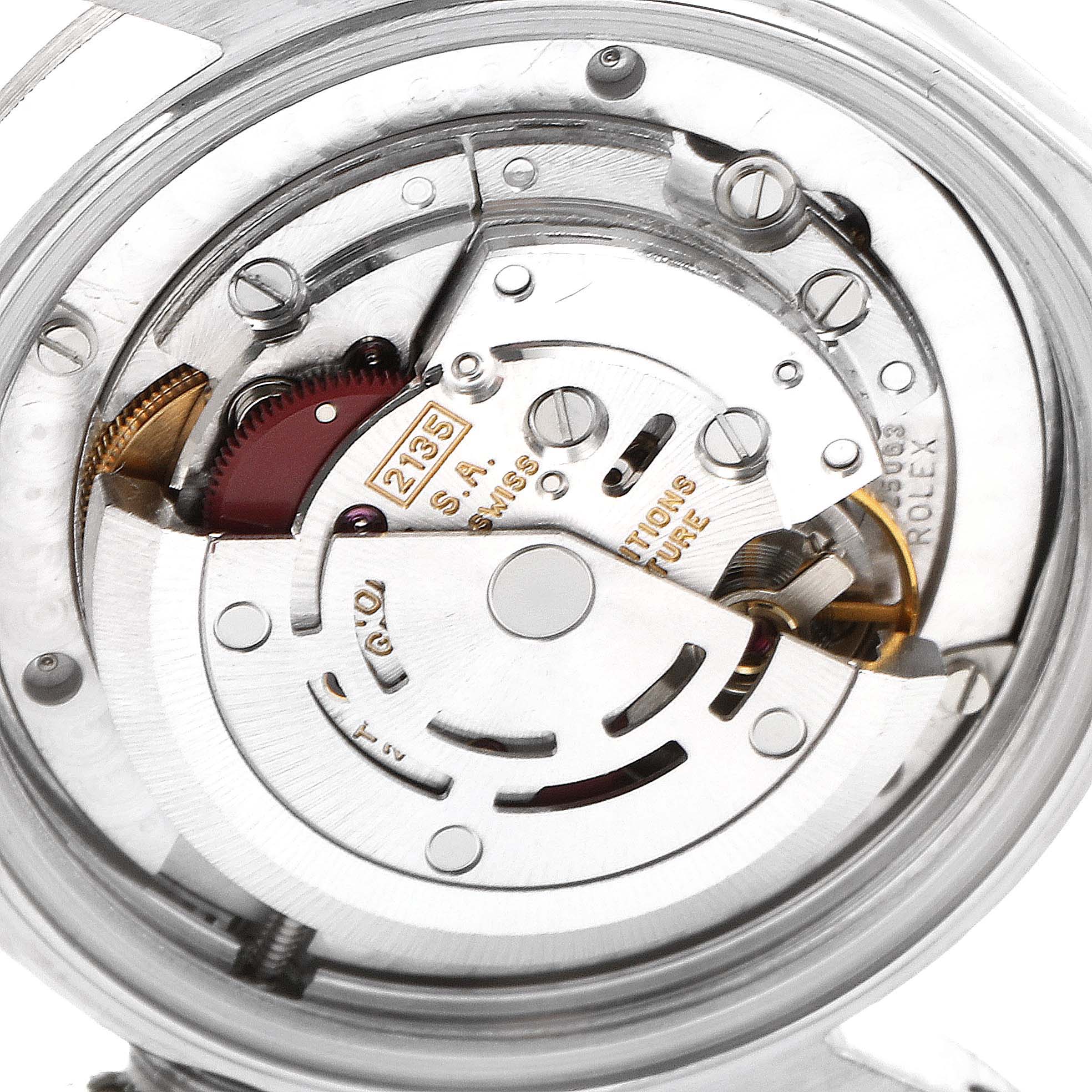 This image shows a close-up view of the internal movement components of a Rolex Mid-Size 68274 Women's Stainless Steel Silver Dial 68274 Women's Stainless Steel Silver Dial watch model, showcasing the detailed mechanics.