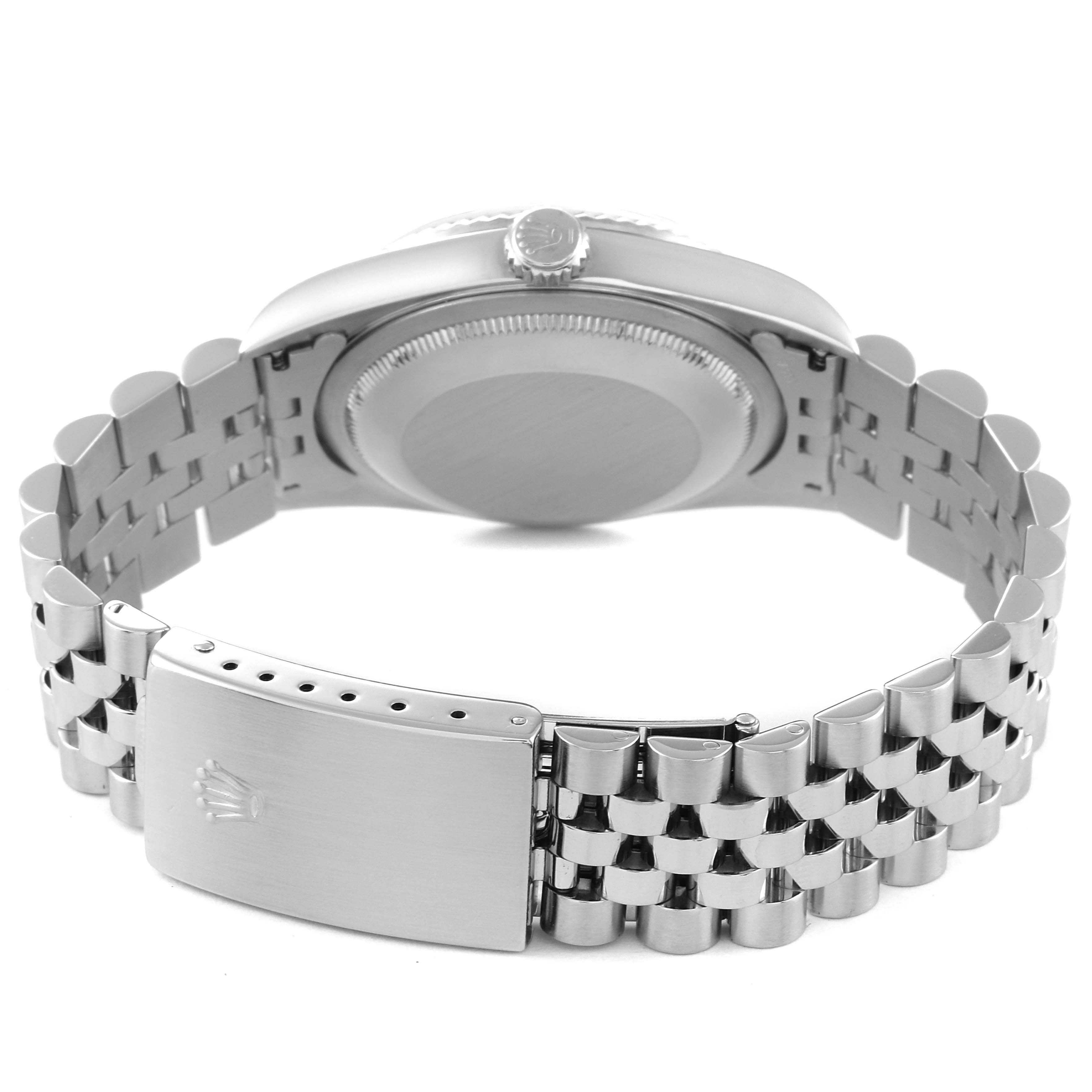 The image shows the back view of a Rolex Datejust 16234 Men's Stainless Steel Black Dial 16234 Men's Stainless Steel Black Dial watch, highlighting the case back and the jubilee bracelet with the clasp open.