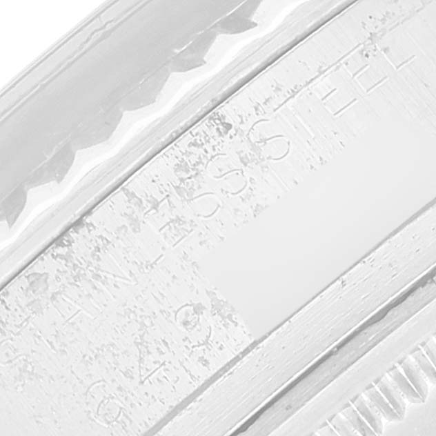 The image shows a close-up view of the case engraving on a Rolex Datejust 16014 Men's Stainless Steel Silver Dial 16014 Men's Stainless Steel Silver Dial watch.