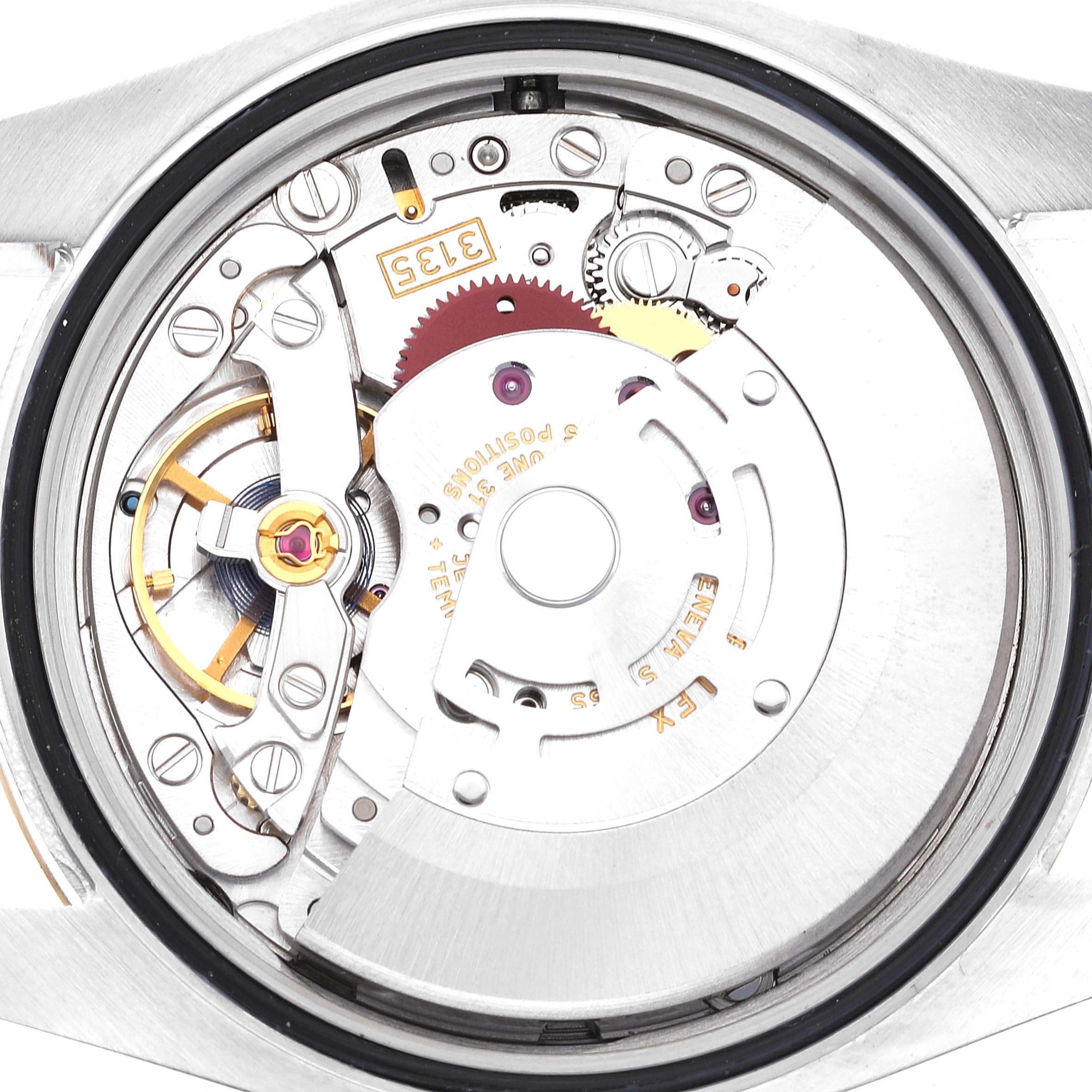 This image shows the movement and inner mechanics of a Rolex Datejust 116233 Men's Steel and Gold (two tone) Silver Dial 116233 Men's Steel and Gold (two tone) Silver Dial watch, viewed from the case back.
