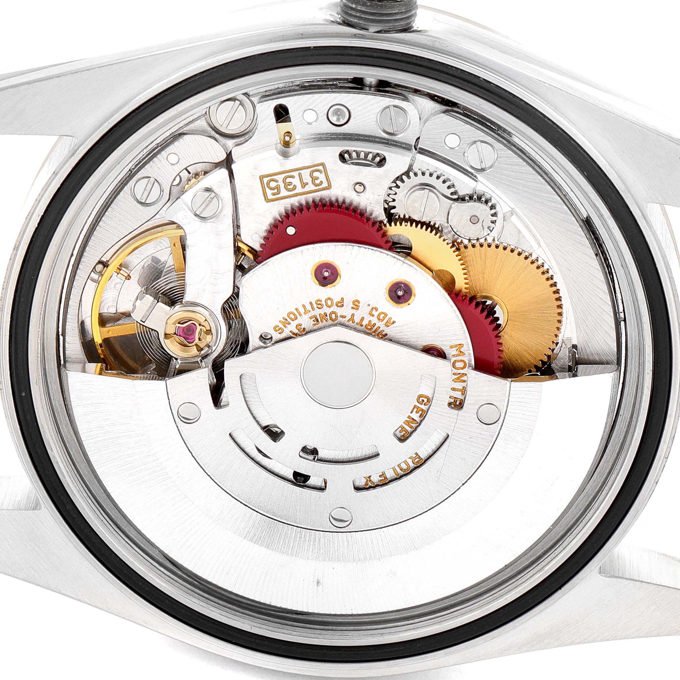 The image shows the internal mechanism of a Rolex Datejust 16233 Men
s Steel and Gold (two tone) Champagne Dial 16233 Men
s Steel and Gold (two tone) Champagne Dial watch from a back view, highlighting its gears and movement components.