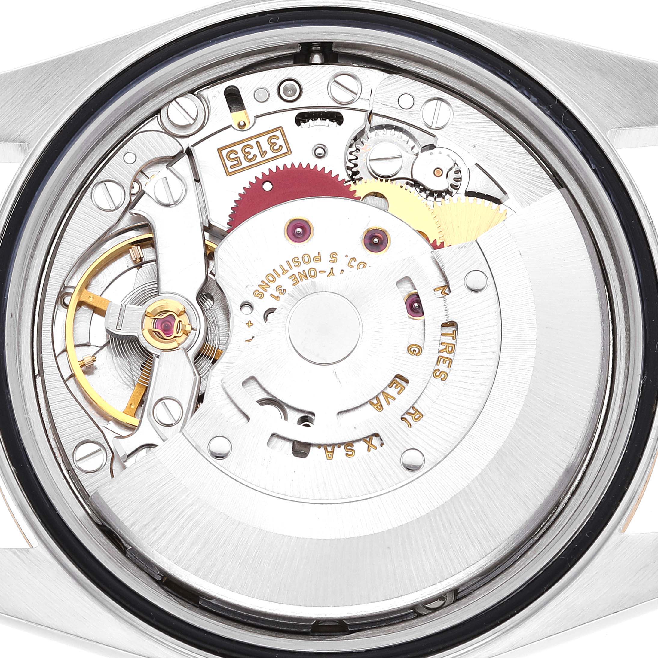 This image shows the movement and internal mechanism of a Rolex Datejust 16233 Men's Steel and Gold (two tone) Champagne Dial 16233 Men's Steel and Gold (two tone) Champagne Dial watch viewed from the back.