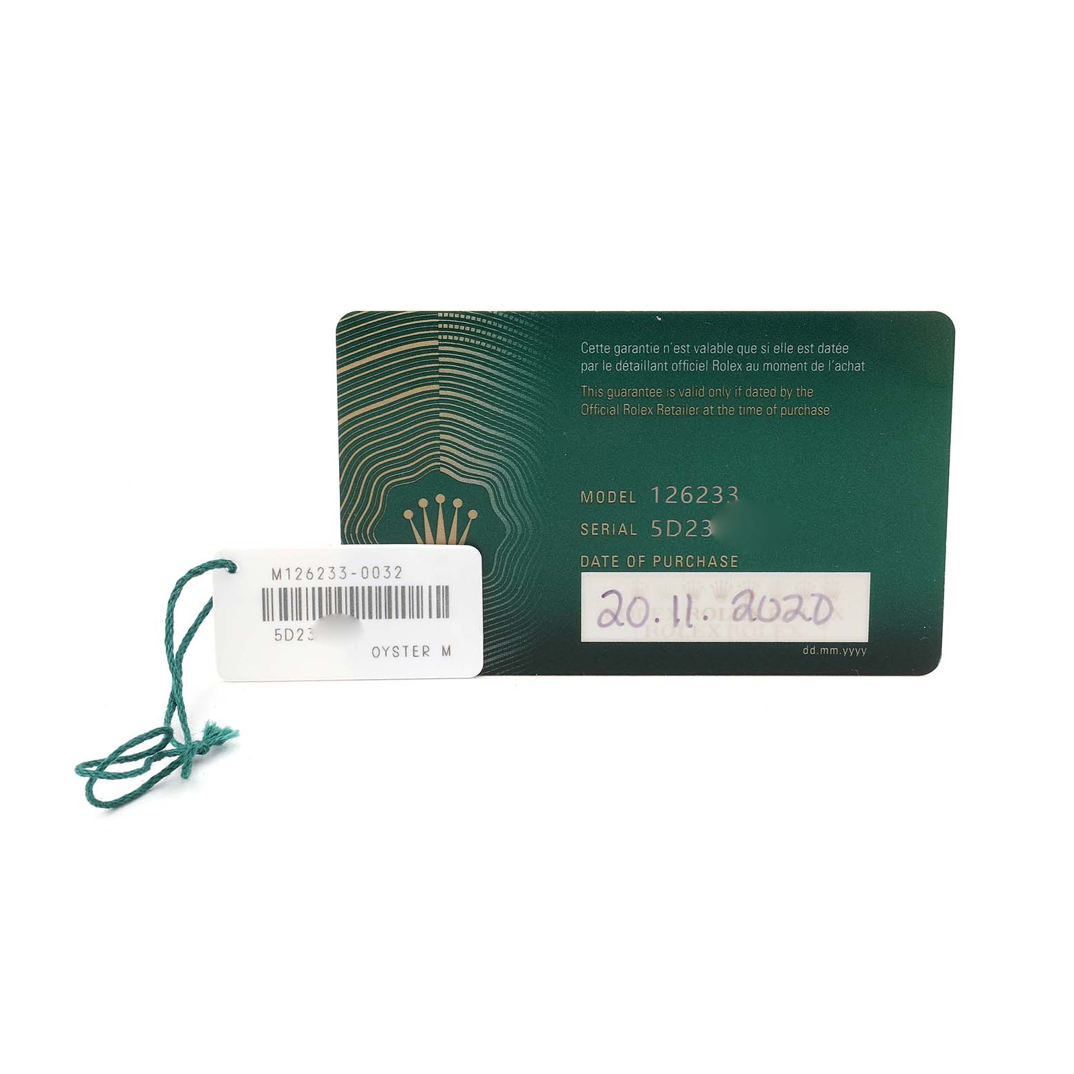 The image shows a Rolex Datejust 126233 Men's Steel and Gold (two tone) Silver Dial model warranty card and a tag with model and serial numbers.