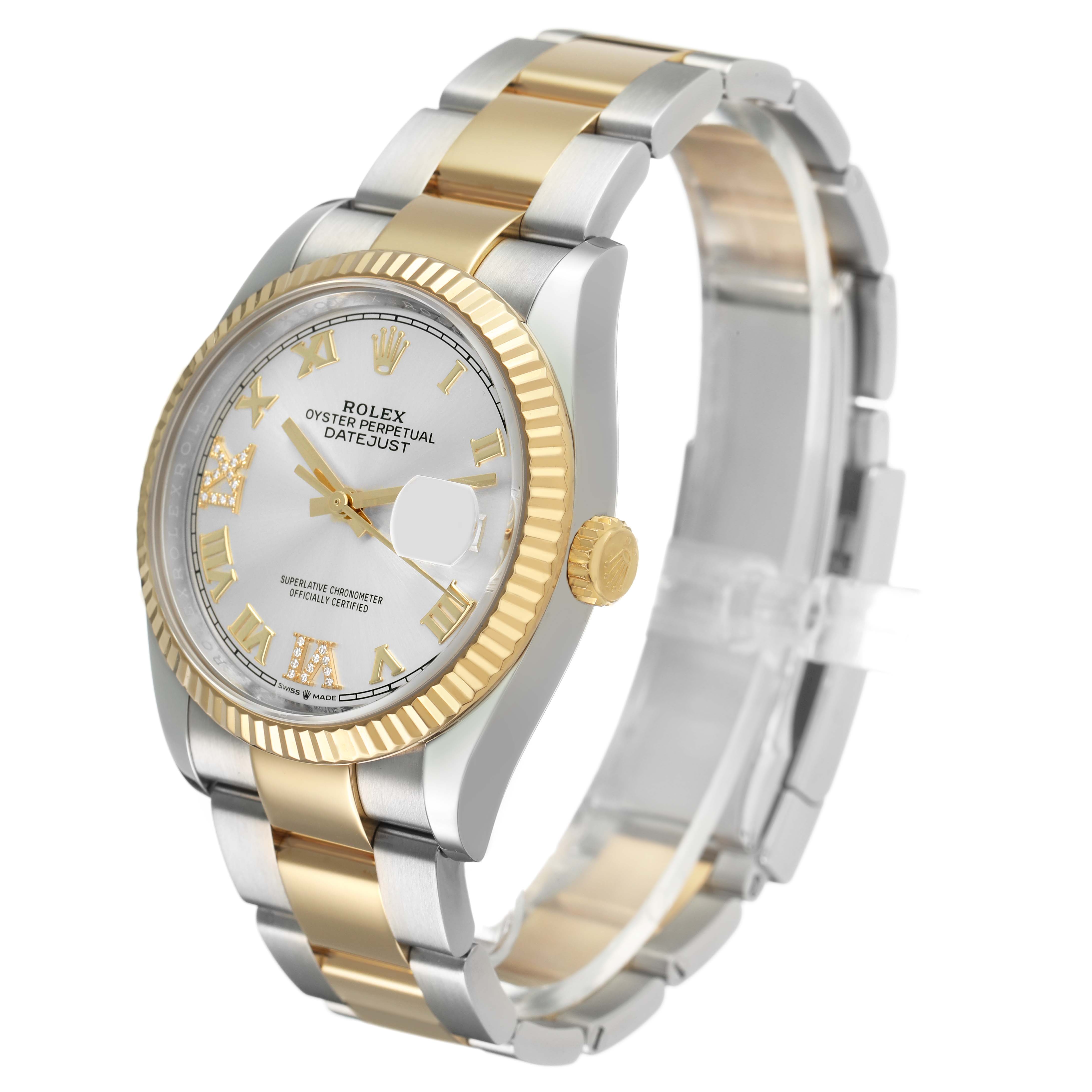 The Rolex Datejust 126233 Men's Steel and Gold (two tone) Silver Dial watch is shown at a three-quarter angle, highlighting its gold fluted bezel, crown, and two-tone bracelet.