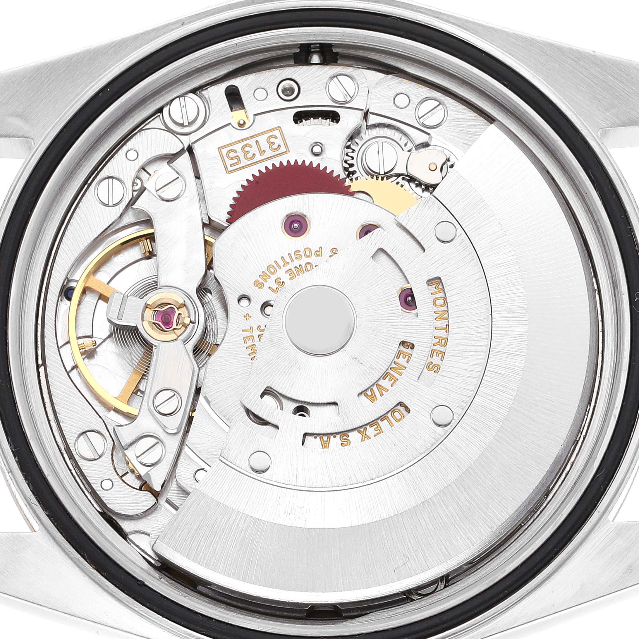 The image shows the movement and internal mechanisms of a Rolex Datejust 16233 Men's Steel and Gold (two tone) White Dial 16233 Men's Steel and Gold (two tone) White Dial watch from a top-down angle.