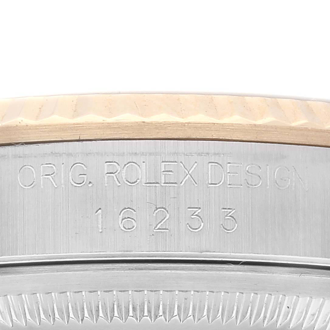 This image shows a close-up of the case side engraving and bezel of a Rolex Datejust 16233 Men's Steel and Gold (two tone) White Dial 16233 Men's Steel and Gold (two tone) White Dial model, displaying "ORIG. ROLEX DESIGN 16233."