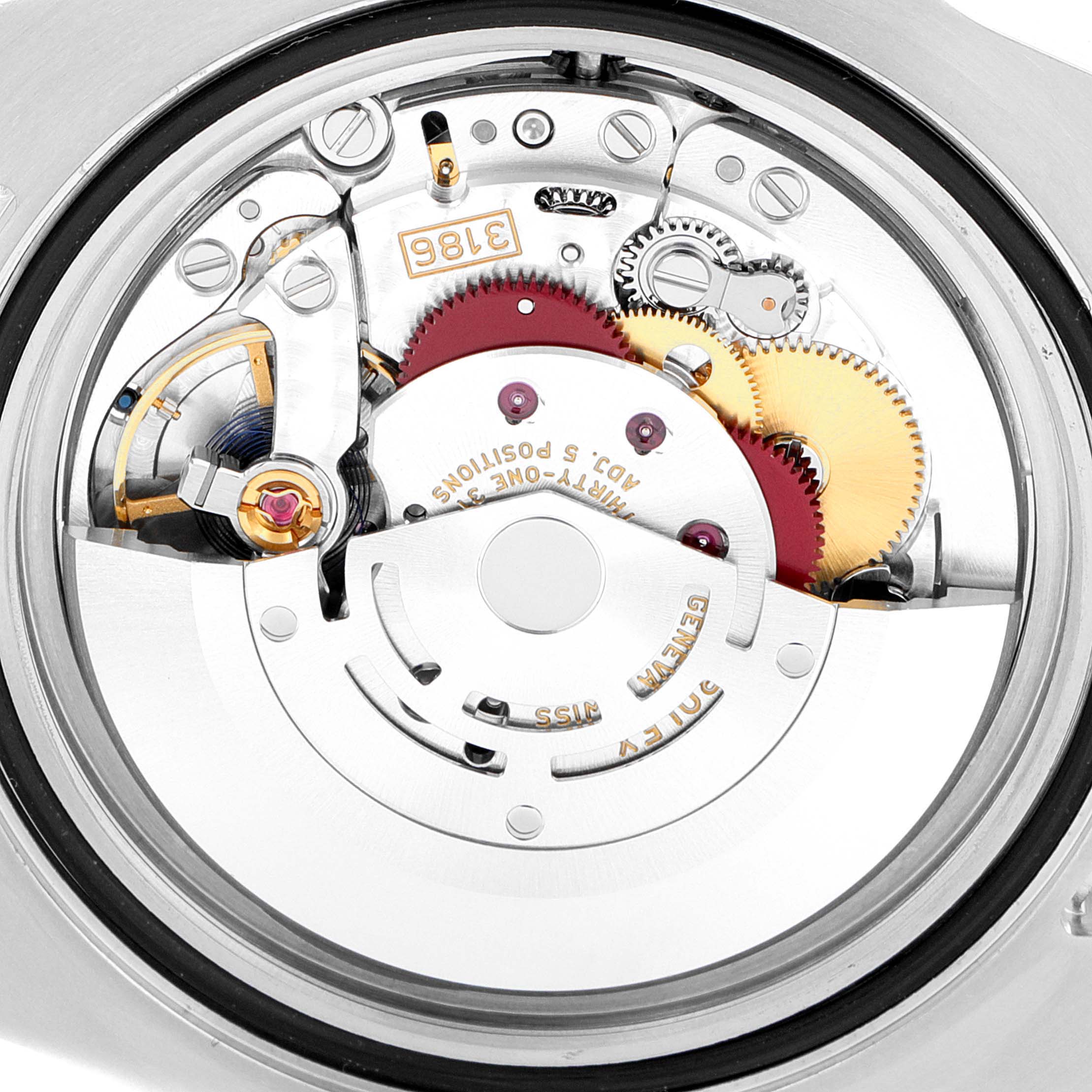 This image shows the internal movement mechanism of a Rolex GMT-Master 116710BLNR Men's Stainless Steel Black Dial 116710BLNR Men's Stainless Steel Black Dial watch from a top-down angle.