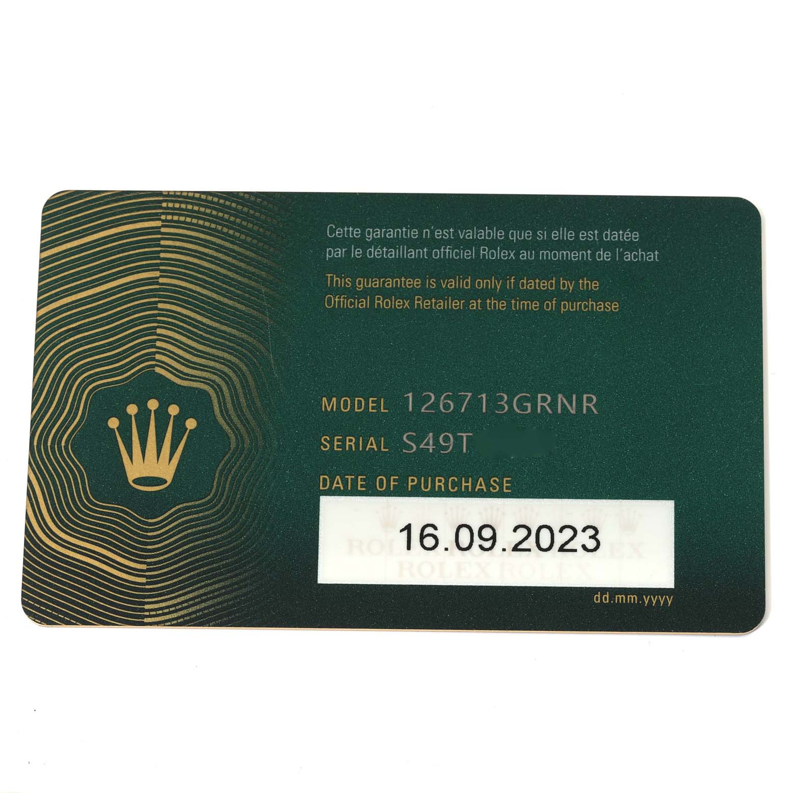 The image shows a warranty card for a Rolex GMT-Master 126713 Men's Steel and Gold (two tone) Black Dial 126713 Men's Steel and Gold (two tone) Black Dial model 126713GRNR, including the serial number and date of purchase.