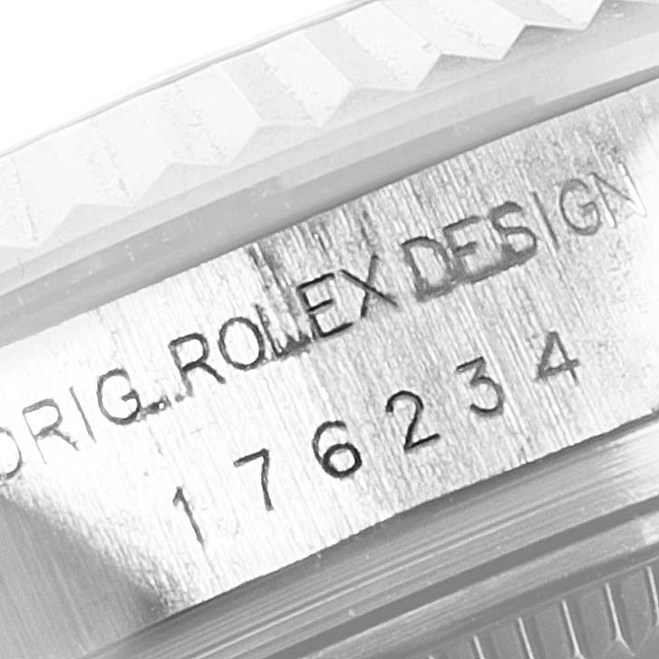 The close-up angle shows part of the bezel and the case, including the engraved model details of the Rolex Oyster Perpetual 176234 Women's Stainless Steel Silver Dial 176234 Women's Stainless Steel Silver Dial watch.