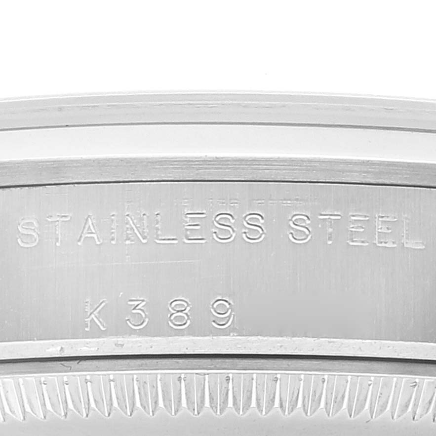 The image shows a close-up view of the stainless steel case back with engraving, on a Rolex Mid-Size 77080 Women's Stainless Steel Blue Dial 77080 Women's Stainless Steel Blue Dial model watch.