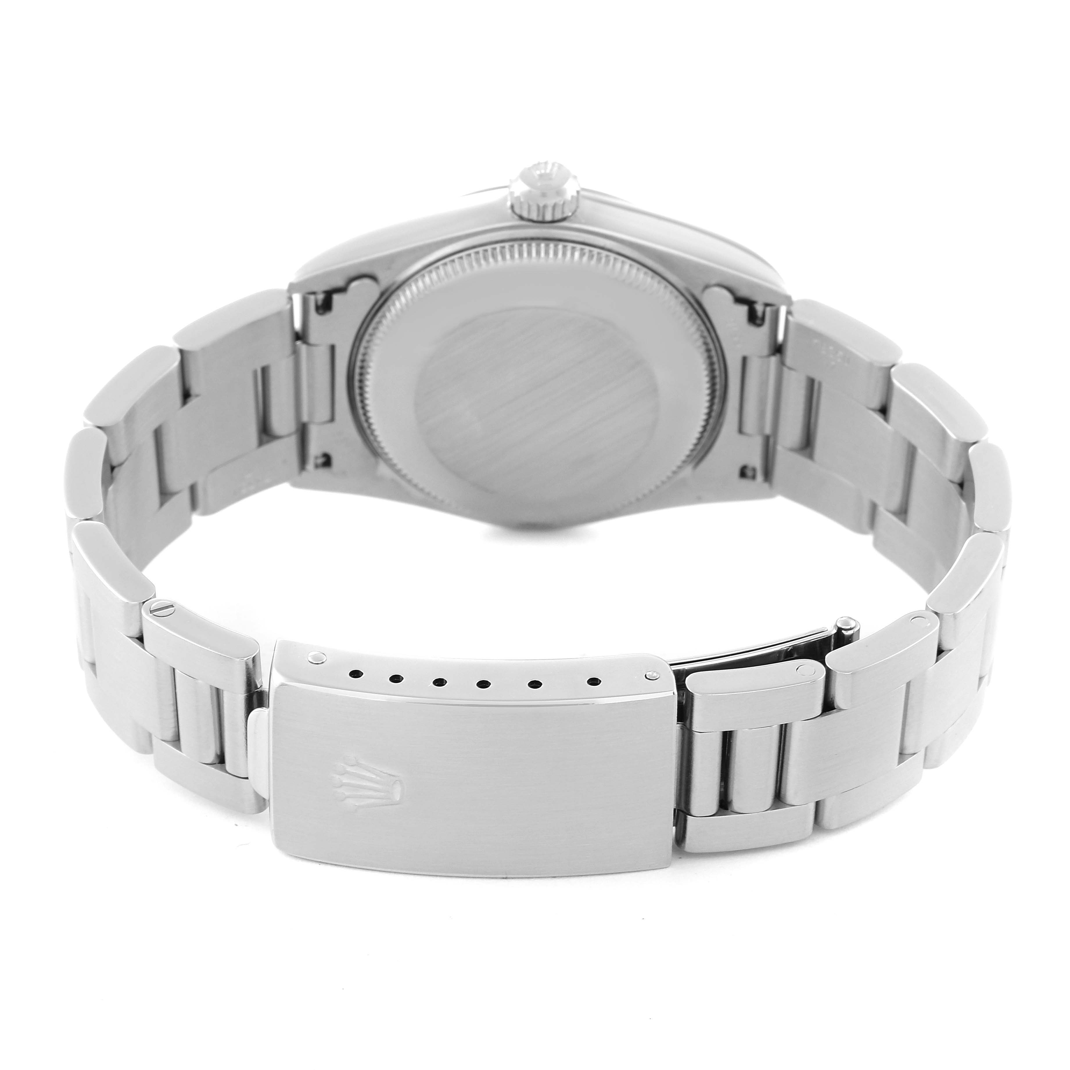 This image shows the back case and bracelet clasp of a Mid-Size Rolex watch from a rear angle.