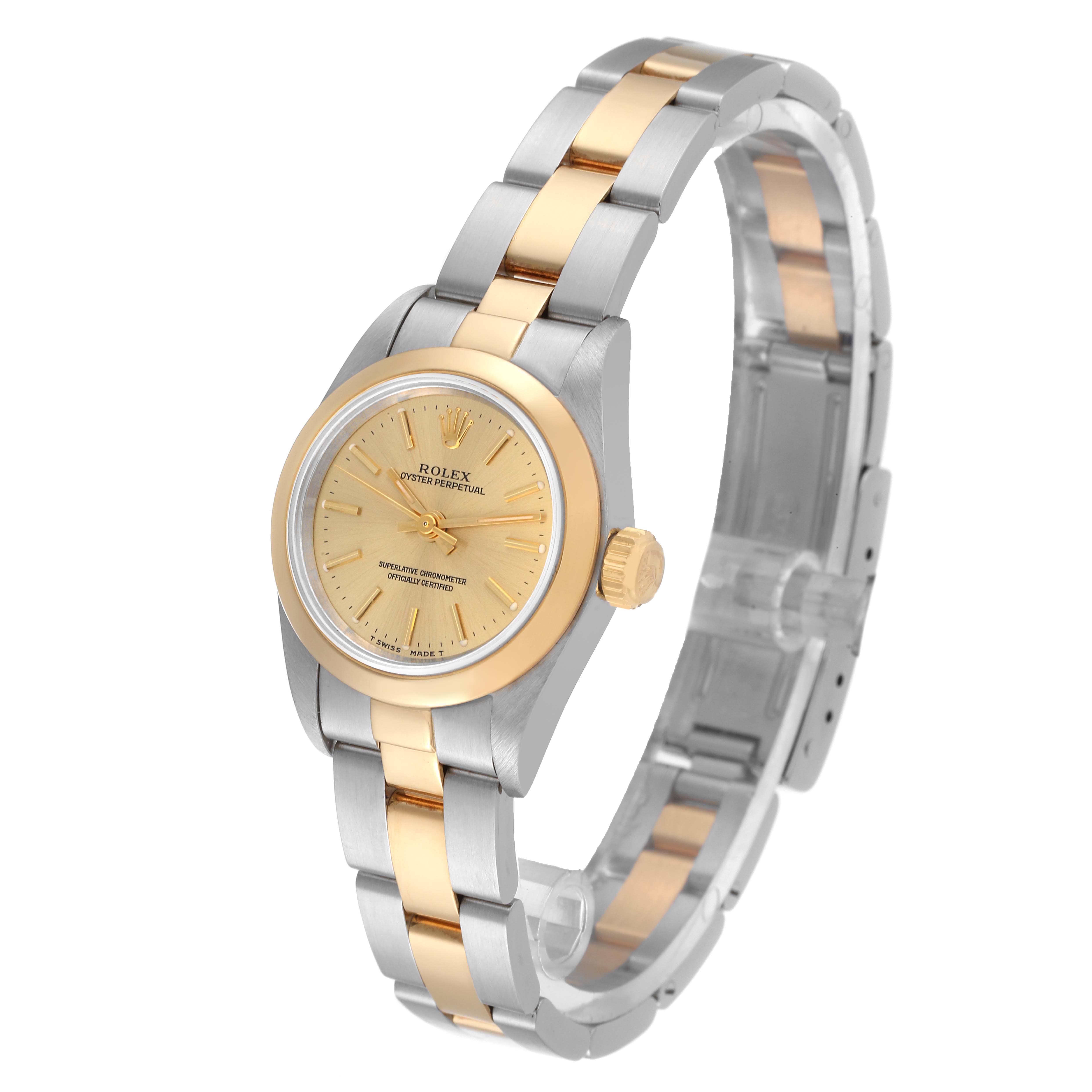 The image shows a Rolex Oyster Perpetual 67183 Women's Steel and Gold (two tone) Champagne Dial 67183 Women's Steel and Gold (two tone) Champagne Dial watch at a three-quarter angle, highlighting the face, bezel, crown, and two-tone bracelet.