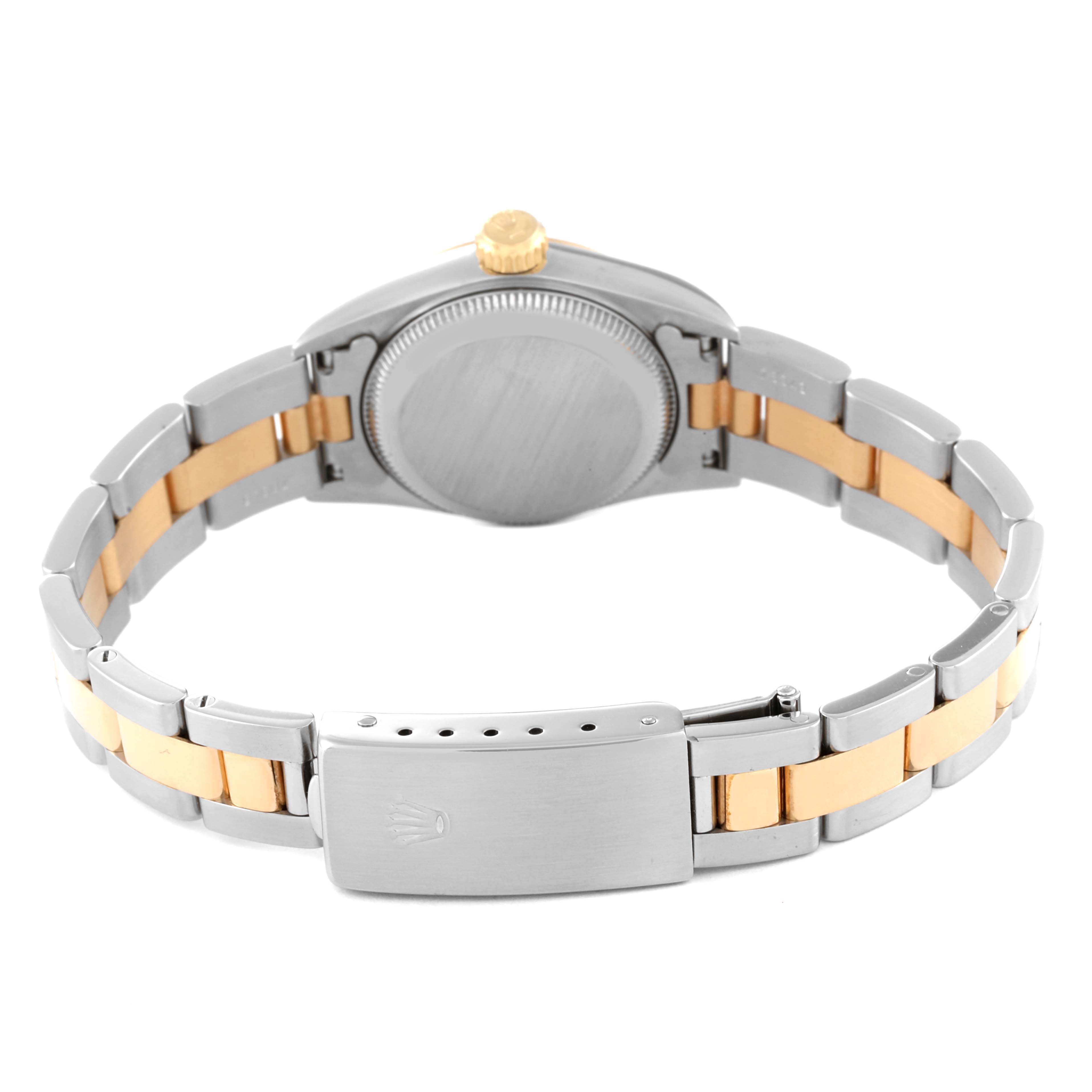 The image shows the back view of a Rolex Oyster Perpetual 67183 Women's Steel and Gold (two tone) Champagne Dial 67183 Women's Steel and Gold (two tone) Champagne Dial watch, highlighting the bracelet and clasp.
