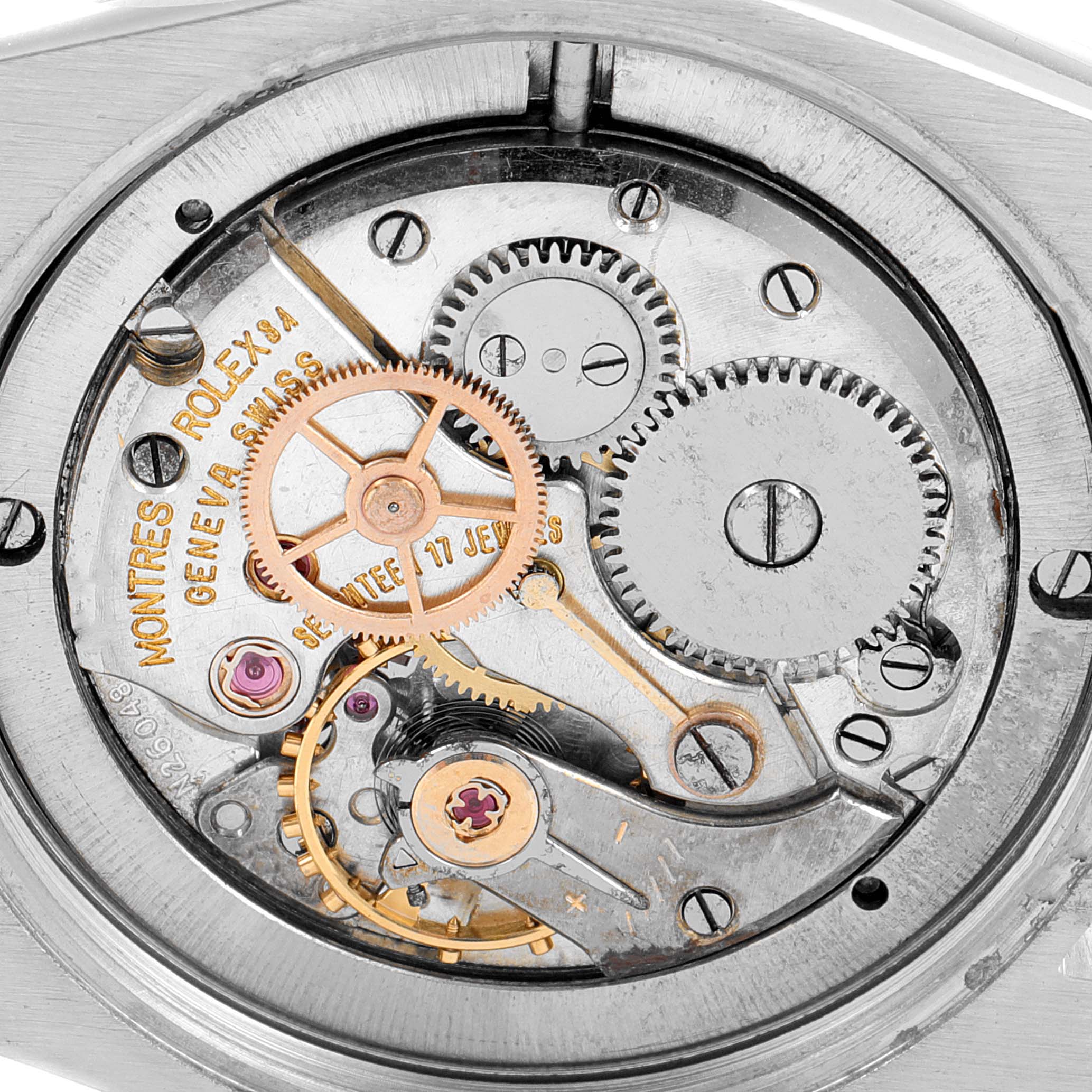 This image shows a close-up view of the internal mechanical movement of the Vintage Collection Rolex watch.