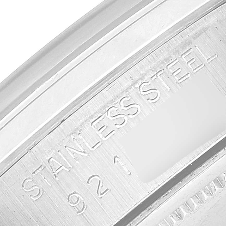 This image shows a close-up of the case back of the Rolex Vintage Collection 6694 Men
s Stainless Steel Silver Dial 6694 Men
s Stainless Steel Silver Dial watch, highlighting the "STAINLESS STEEL" engraving.