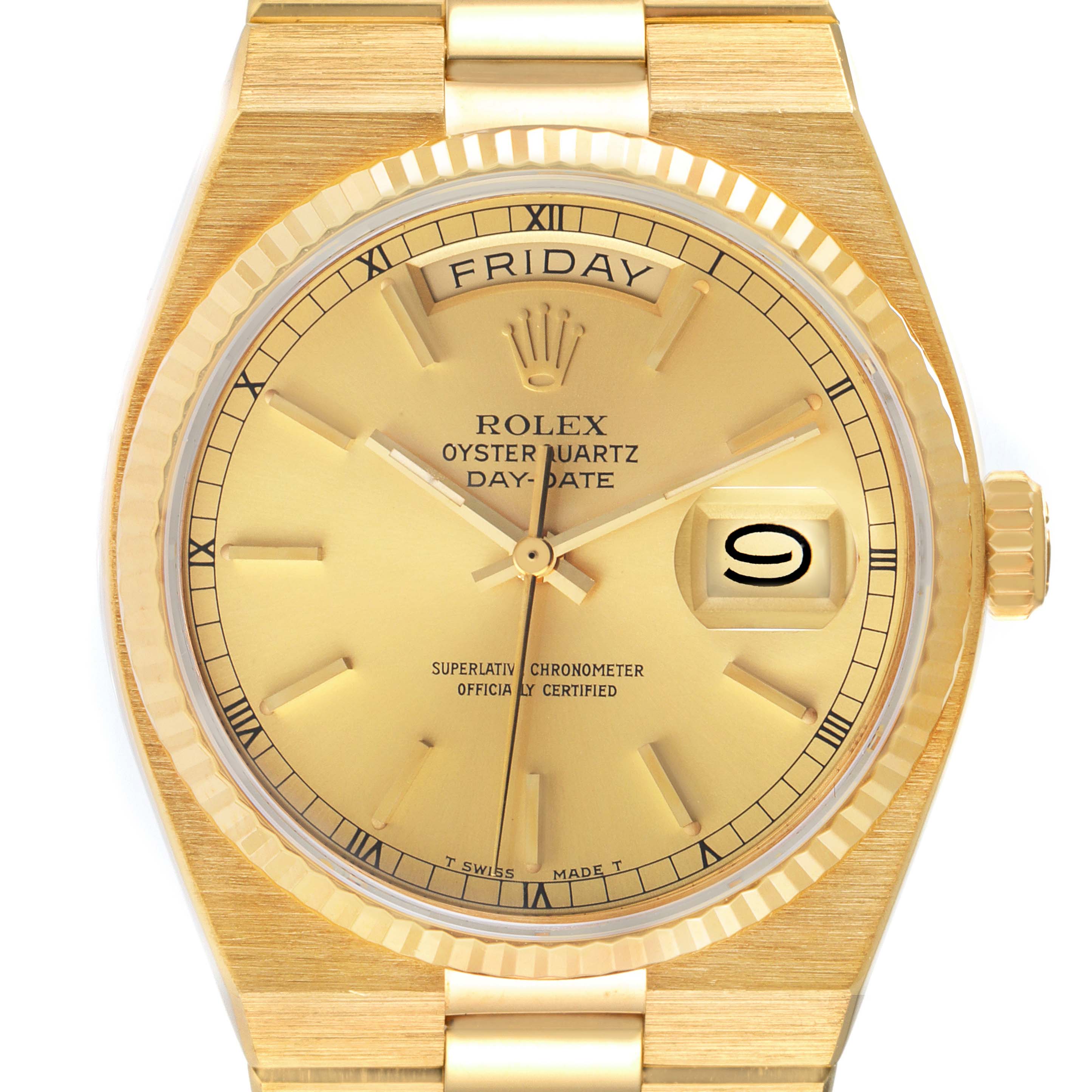 The image shows a close-up of the Rolex Oysterquartz 19018 Men
s Yellow Gold Champagne Dial 19018 Men
s Yellow Gold Champagne Dial Day-Date watch face, displaying the dial, hands, bezel, and part of the bracelet.