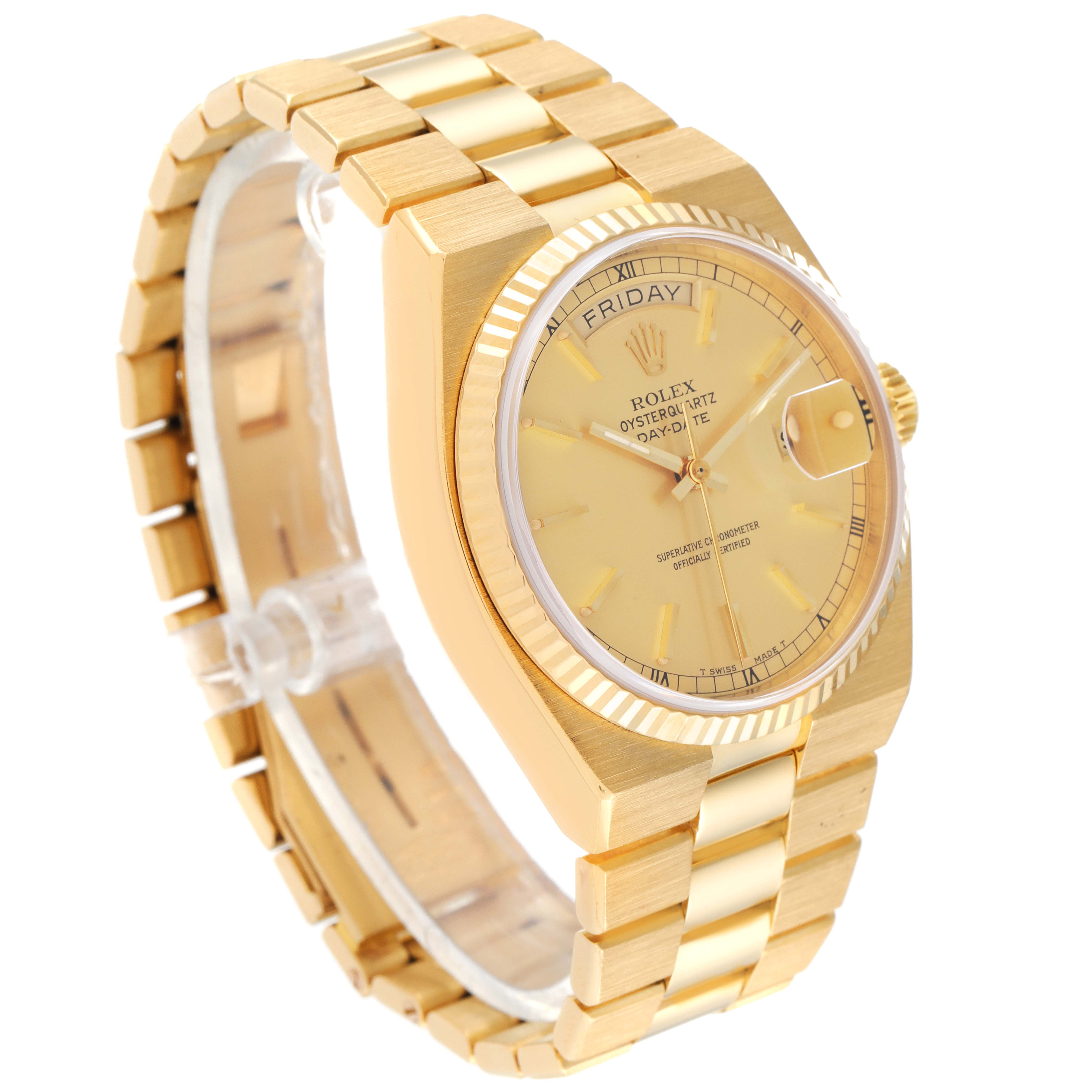 The image shows a Rolex Oysterquartz 19018 Men
s Yellow Gold Champagne Dial 19018 Men
s Yellow Gold Champagne Dial Day-Date watch at a three-quarter angle, highlighting its gold bracelet, case, and dial.