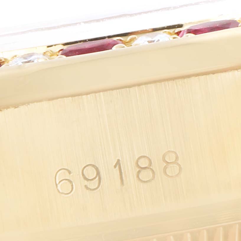 The image shows a close-up of the case side of a Rolex President 69188 Women's Yellow Gold Champagne Dial 69188 Women's Yellow Gold Champagne Dial model, displaying the model number 69188 and part of the gem-set bezel.