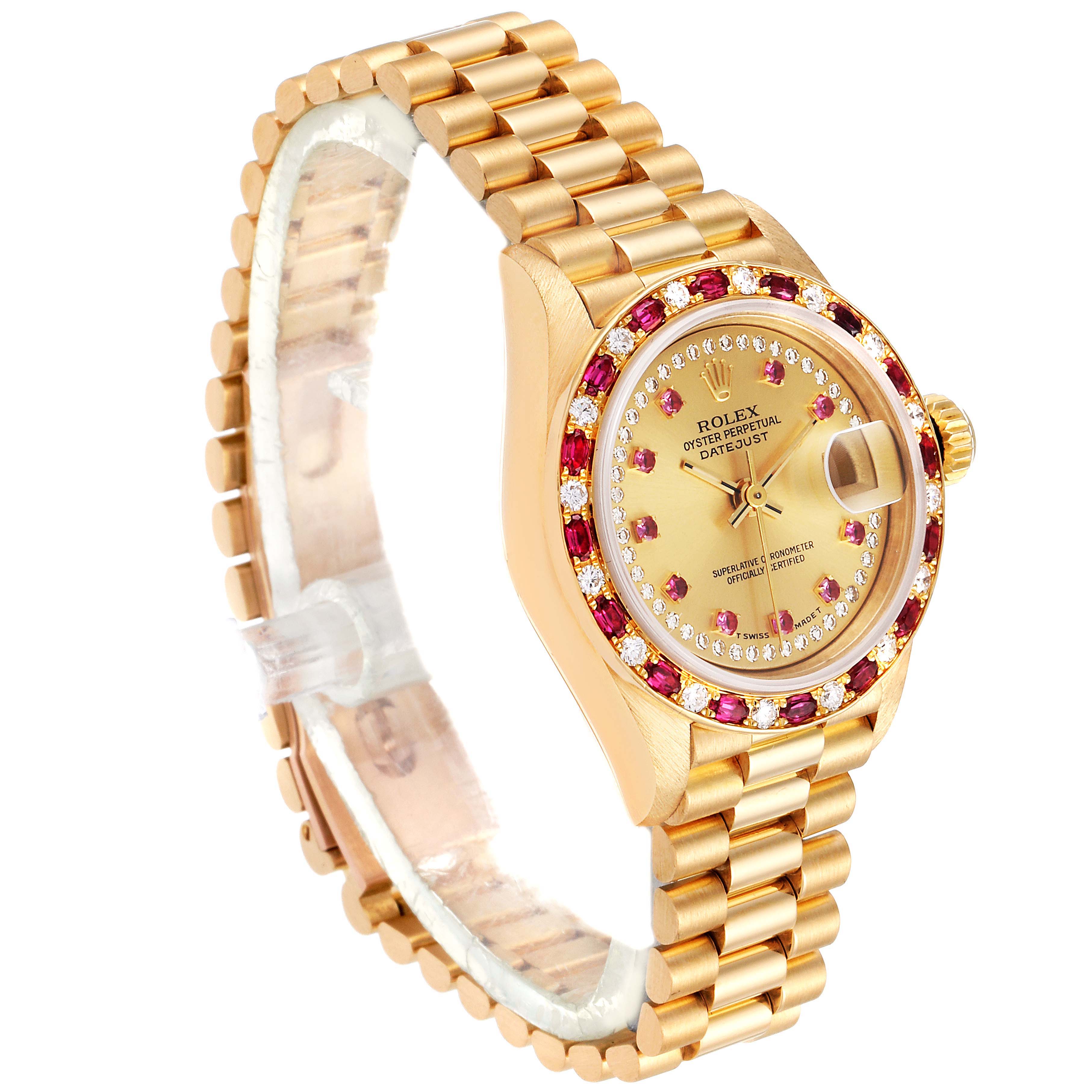 The Rolex President 69188 Women's Yellow Gold Champagne Dial 69188 Women's Yellow Gold Champagne Dial model watch shown at an angle highlights the gold bracelet, jeweled bezel, and dial with date display.