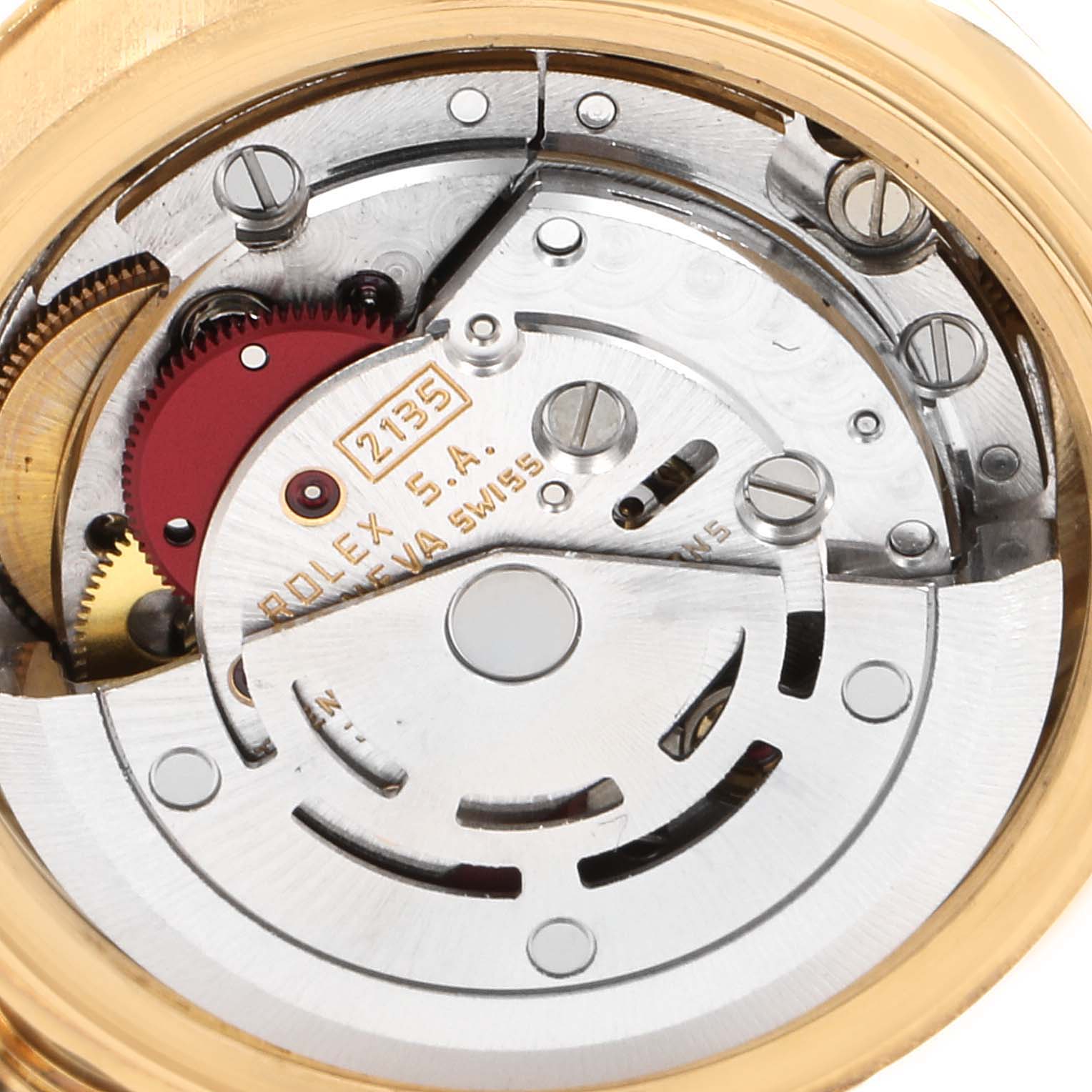 The image shows a close-up view of the Rolex President 69178 Women's Yellow Gold Champagne Dial 69178 Women's Yellow Gold Champagne Dial model's internal movement mechanism, specifically the caliber 2135.