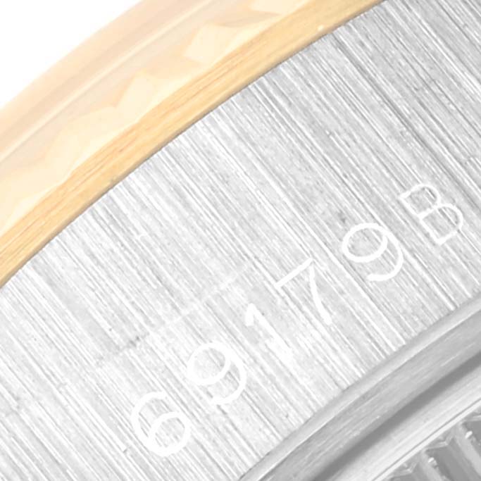 This close-up image shows the model number engraved on the side of a Rolex President 69179 Women's White Gold Mother of Pearl Dial 69179 Women's White Gold Mother of Pearl Dial watch bezel.