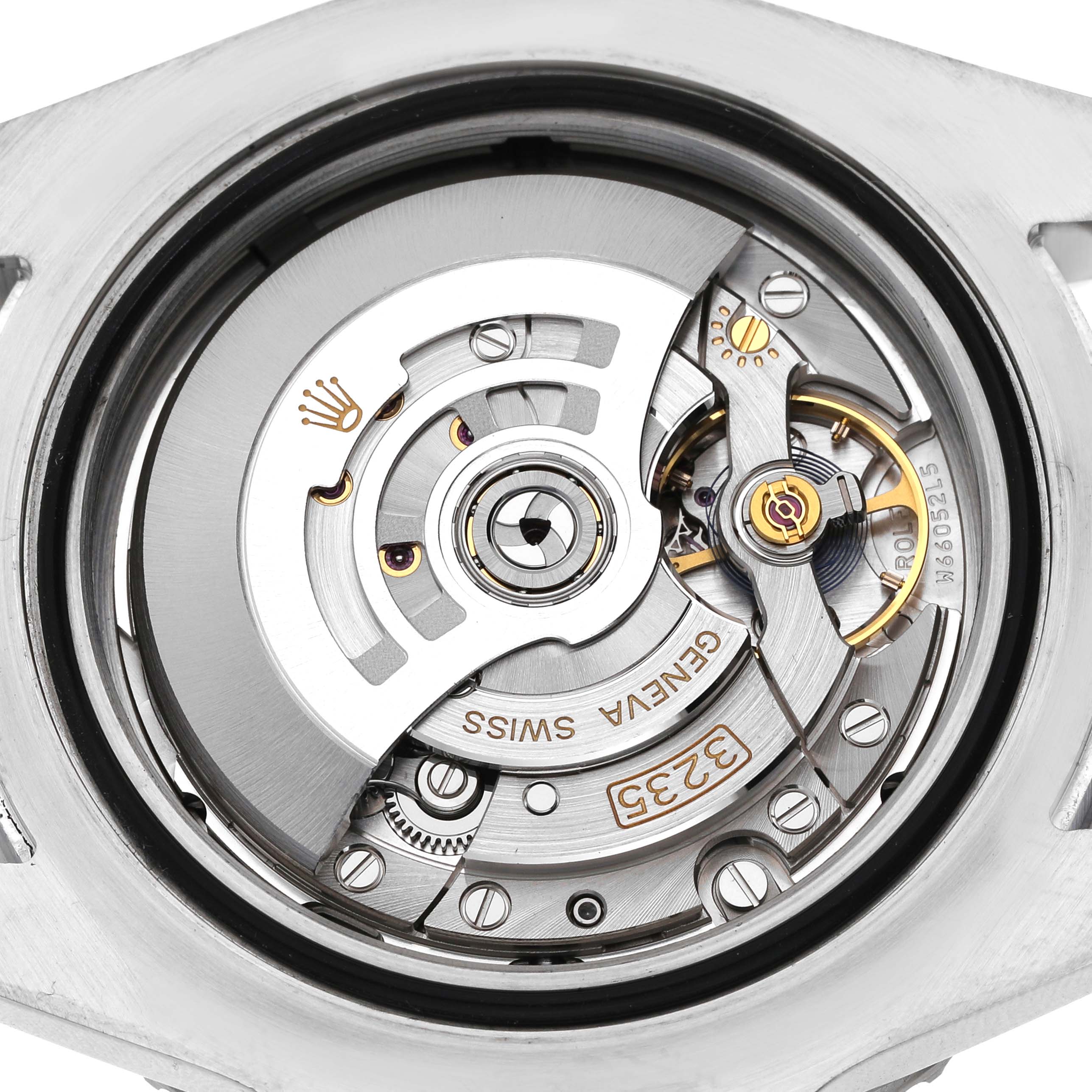 The image shows the movement of a Rolex Sea-Dweller 126600 Men's Stainless Steel Black Dial watch from a top-down angle, highlighting the intricate internal mechanism.