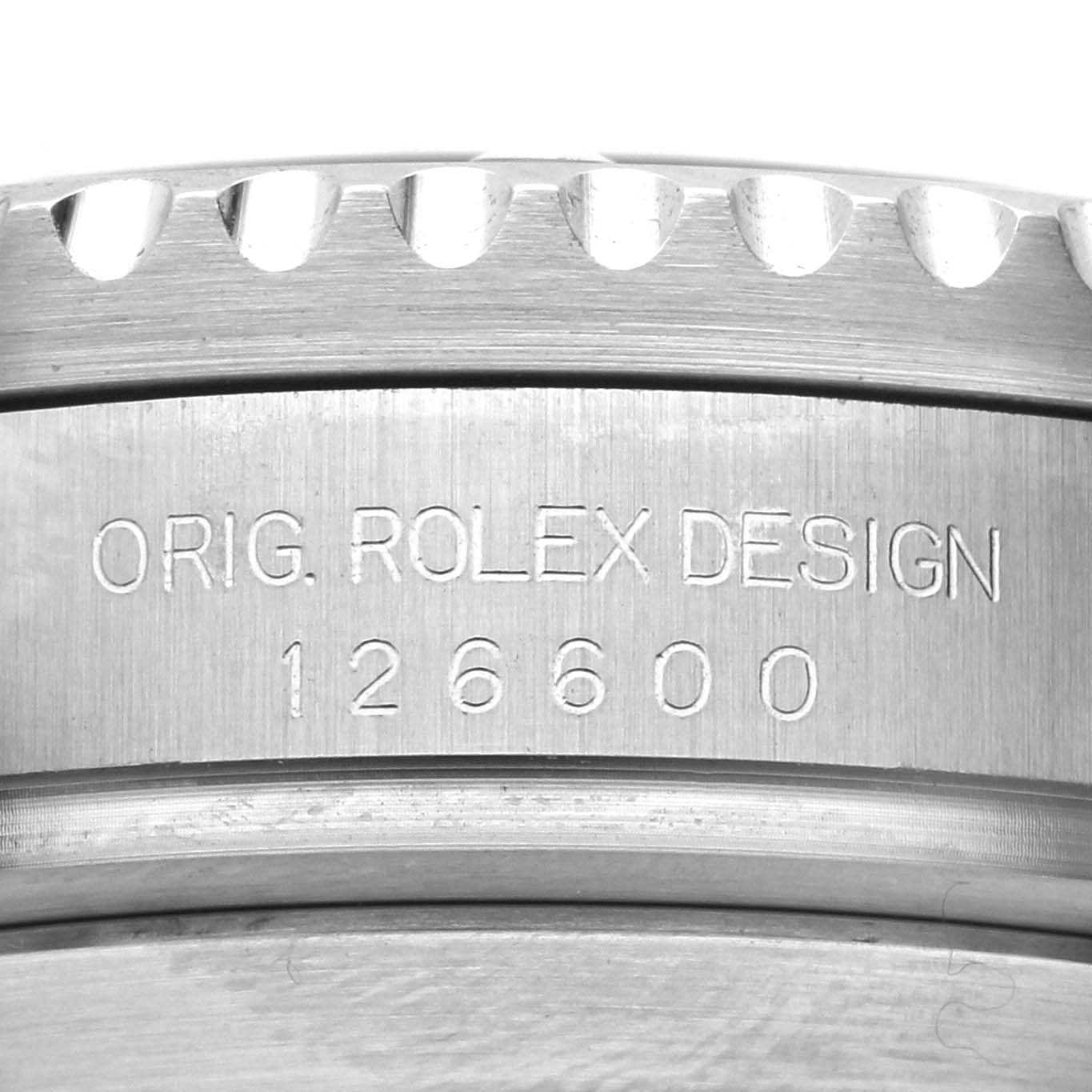 The image shows a close-up of the case side of the Rolex Sea-Dweller 126600 Men's Stainless Steel Black Dial, featuring its model number and branding.