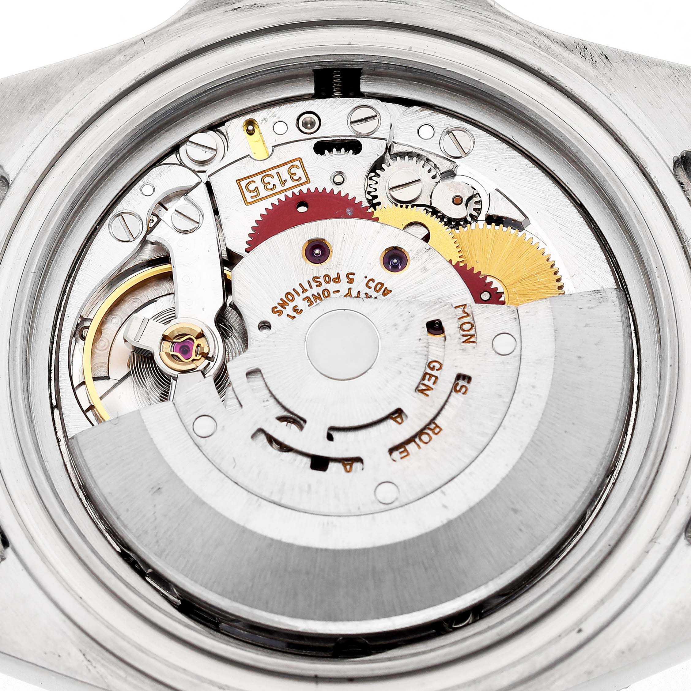 The image shows the intricate inner movement of a Rolex Submariner 16610 Men's Stainless Steel Black Dial watch from a top-down angle.