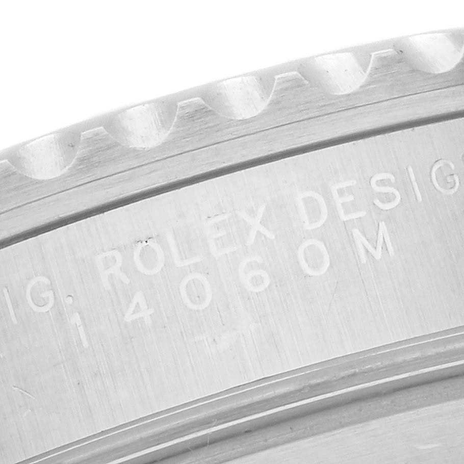 This is a close-up view of the case back of a Rolex Submariner 14060 Men
s Stainless Steel Black Dial 14060 Men
s Stainless Steel Black Dial watch, showcasing the engraving details.