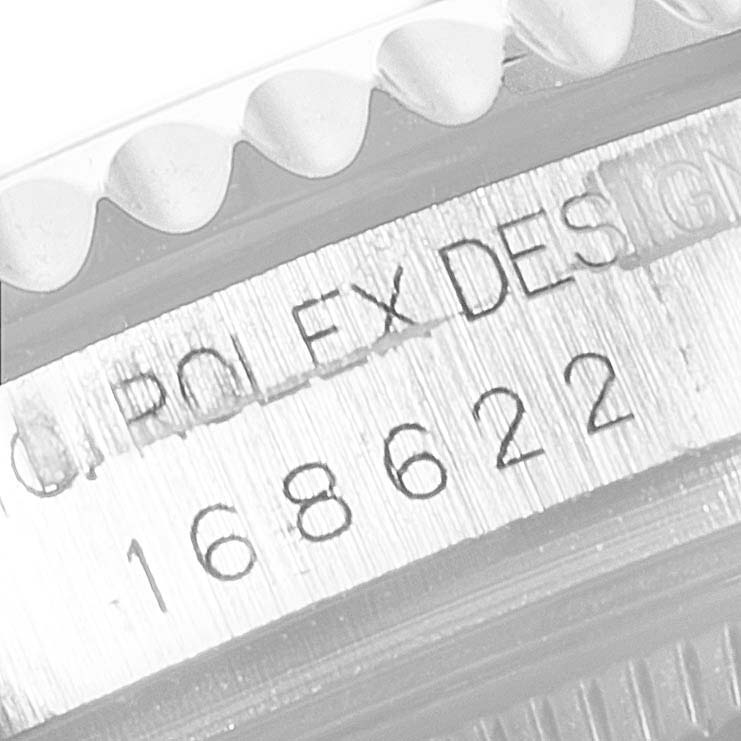 This close-up image shows the model number "168622" and the "Rolex Design" inscription on the Yacht-Master by Rolex.