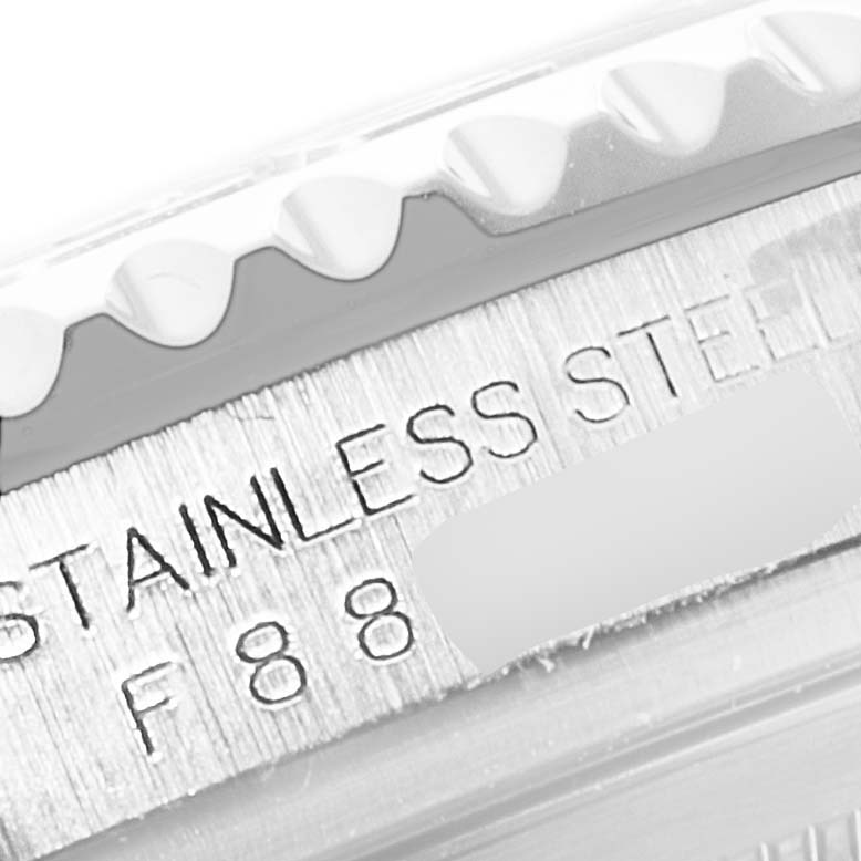 This close-up image shows the stainless steel engraving on the bezel of a Rolex Yacht-Master 16622 Men's Stainless Steel Silver Dial 16622 Men's Stainless Steel Silver Dial watch.