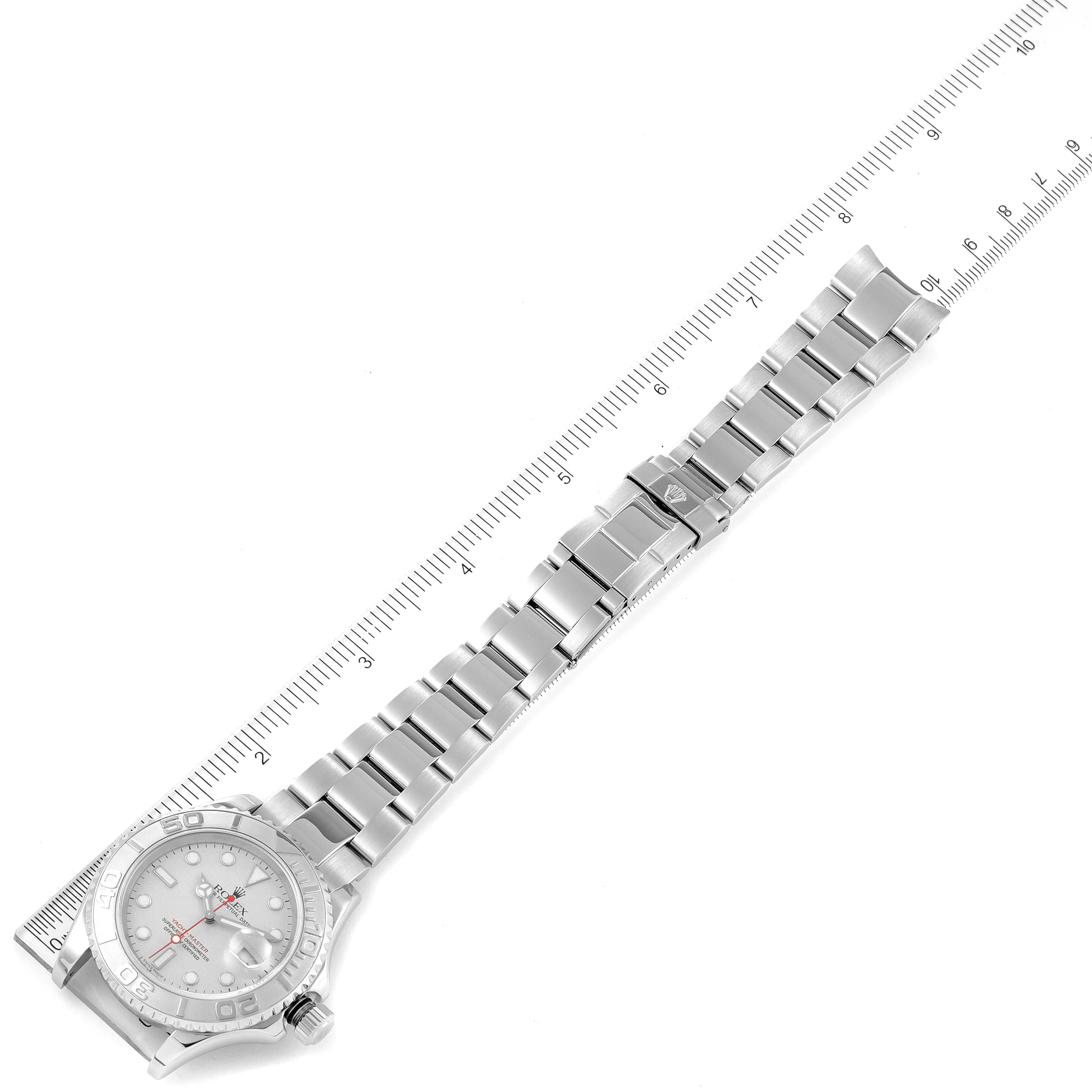 The image shows a Rolex Yacht-Master 16622 Men's Stainless Steel Silver Dial 16622 Men's Stainless Steel Silver Dial watch flat from above, including the face, bezel, crown, and metal bracelet with a ruler alongside for scale.