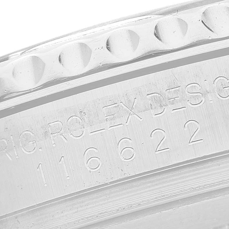 The image shows a close-up of the engraved bezel of a Rolex Yacht-Master 116622 Men's Stainless Steel Silver Dial watch, highlighting the model number.