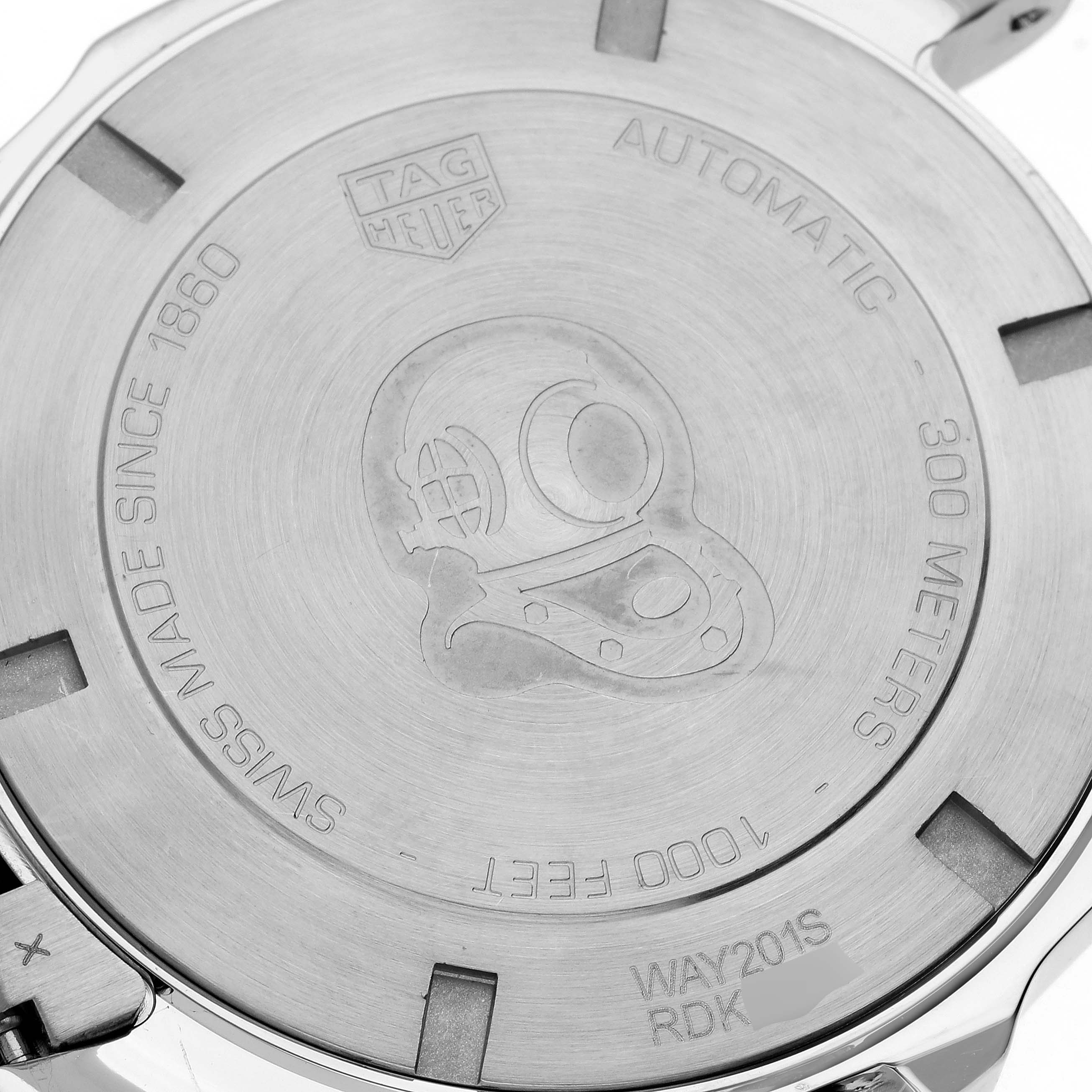 The image shows the back case of the Tag Heuer Aquaracer WAY201S Men's Stainless Steel Green Dial WAY201S Men's Stainless Steel Green Dial watch, featuring the brand's logo, model details, and water resistance information.