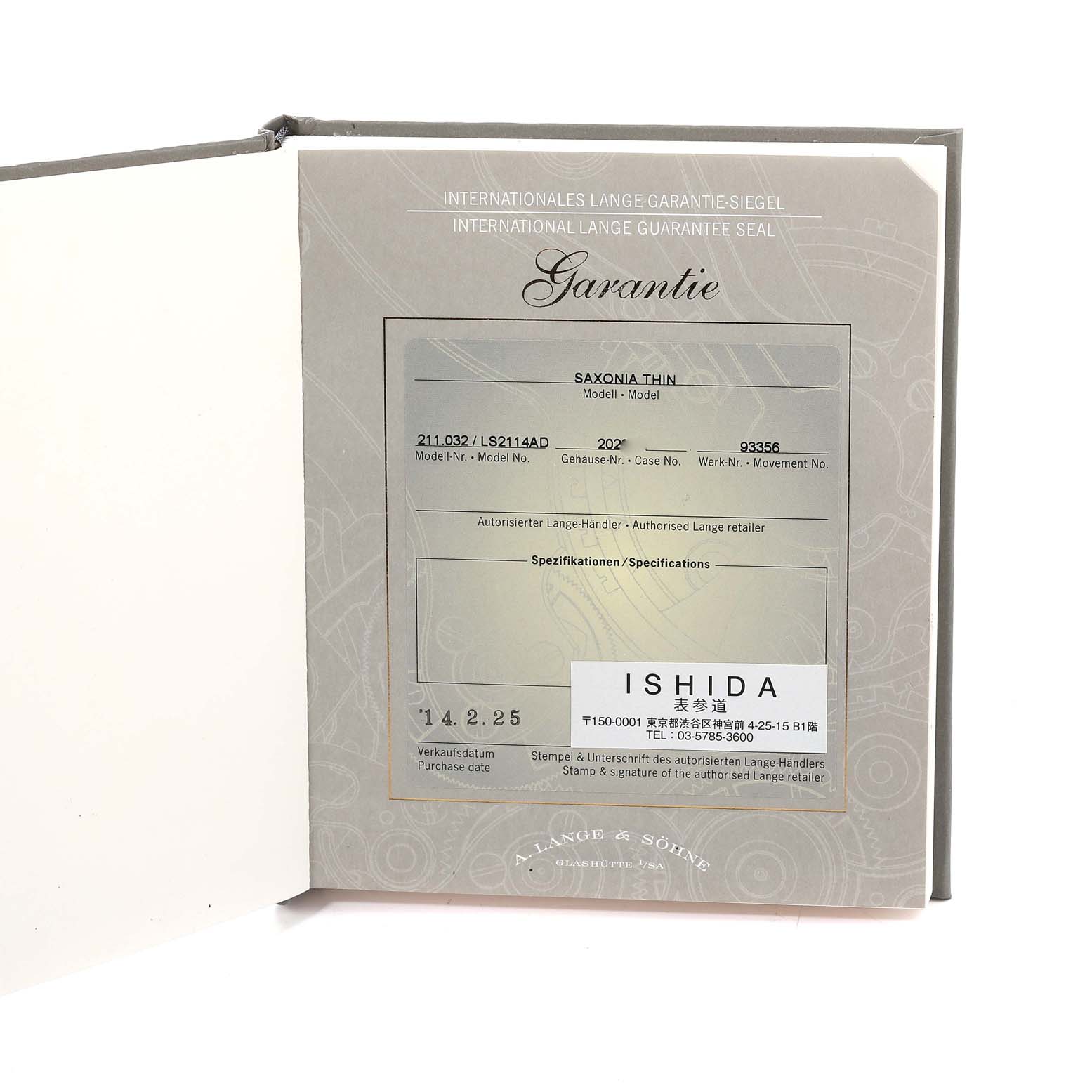 The image shows the guarantee card and certificate for the Saxonia Thin model by A. Lange & Söhne from a front-facing angle.
