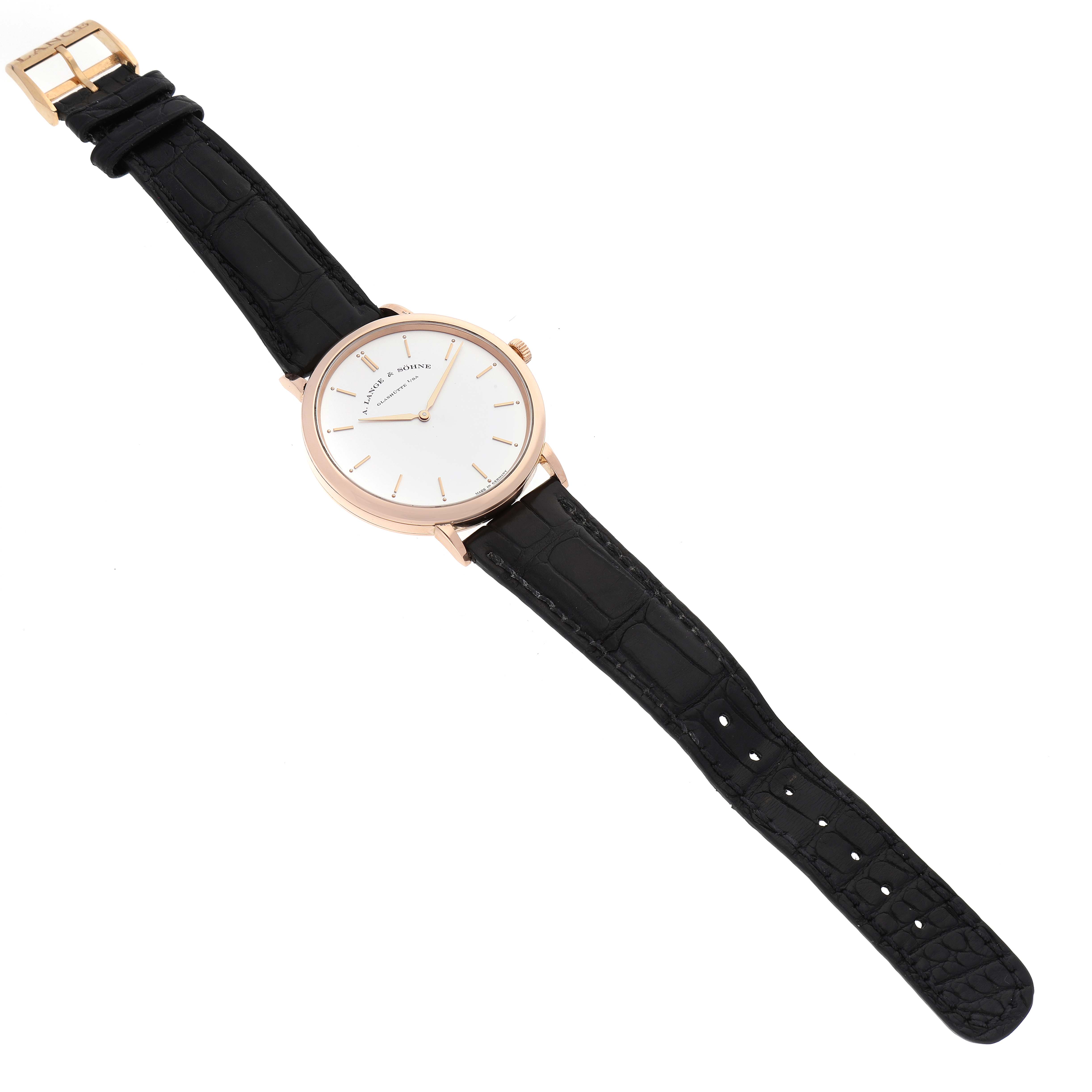 The image shows a top-down view of the A. Lange & Sohne Saxonia 211.032 Men's Rose Gold Silver Dial watch, featuring a gold case and black leather strap.