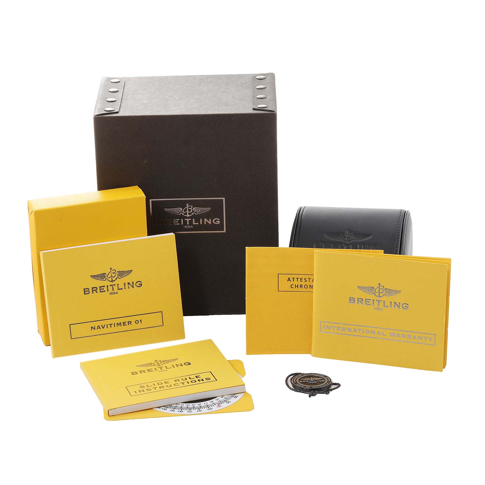 The image displays accessories for the Breitling Navitimer AB0120 Men
s Stainless Steel Black Dial AB0120 Men
s Stainless Steel Black Dial model, including boxes, booklets, and a leather watch case.