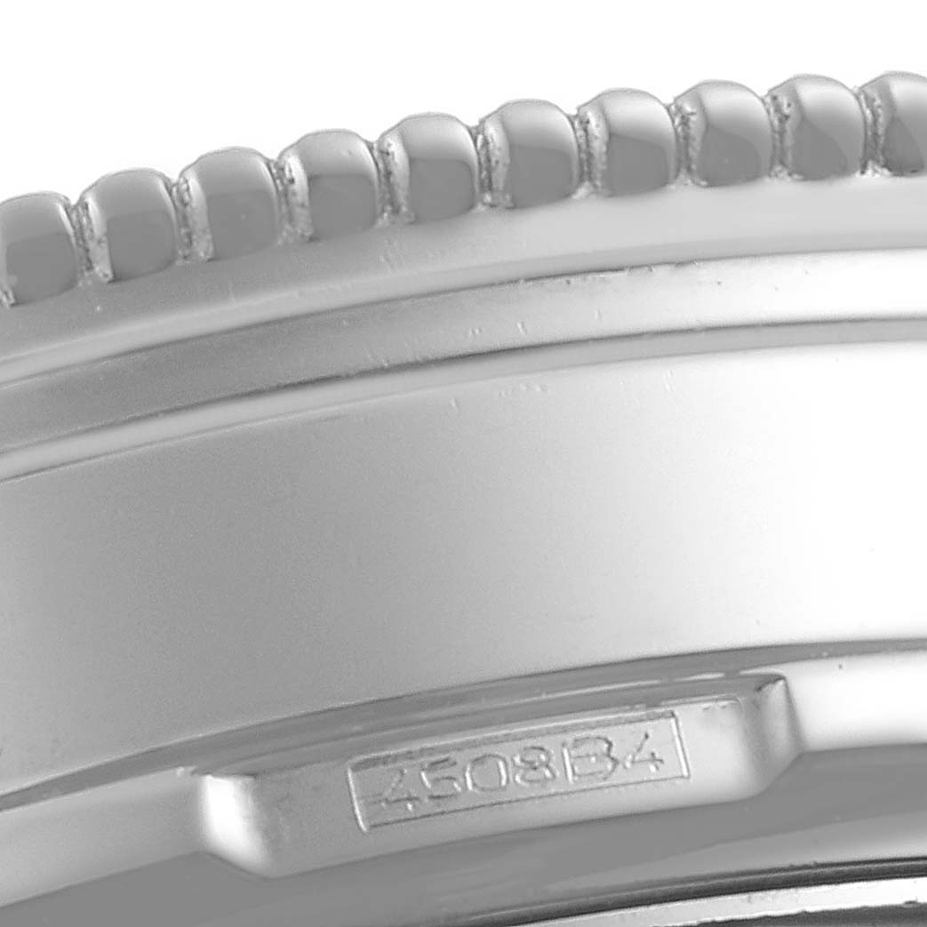 The image shows a close-up view of the bezel and part of the case of a Breitling Navitimer A19350 Men's Stainless Steel Silver Dial A19350 Men's Stainless Steel Silver Dial watch, focusing on the ridged bezel and engraved model number.