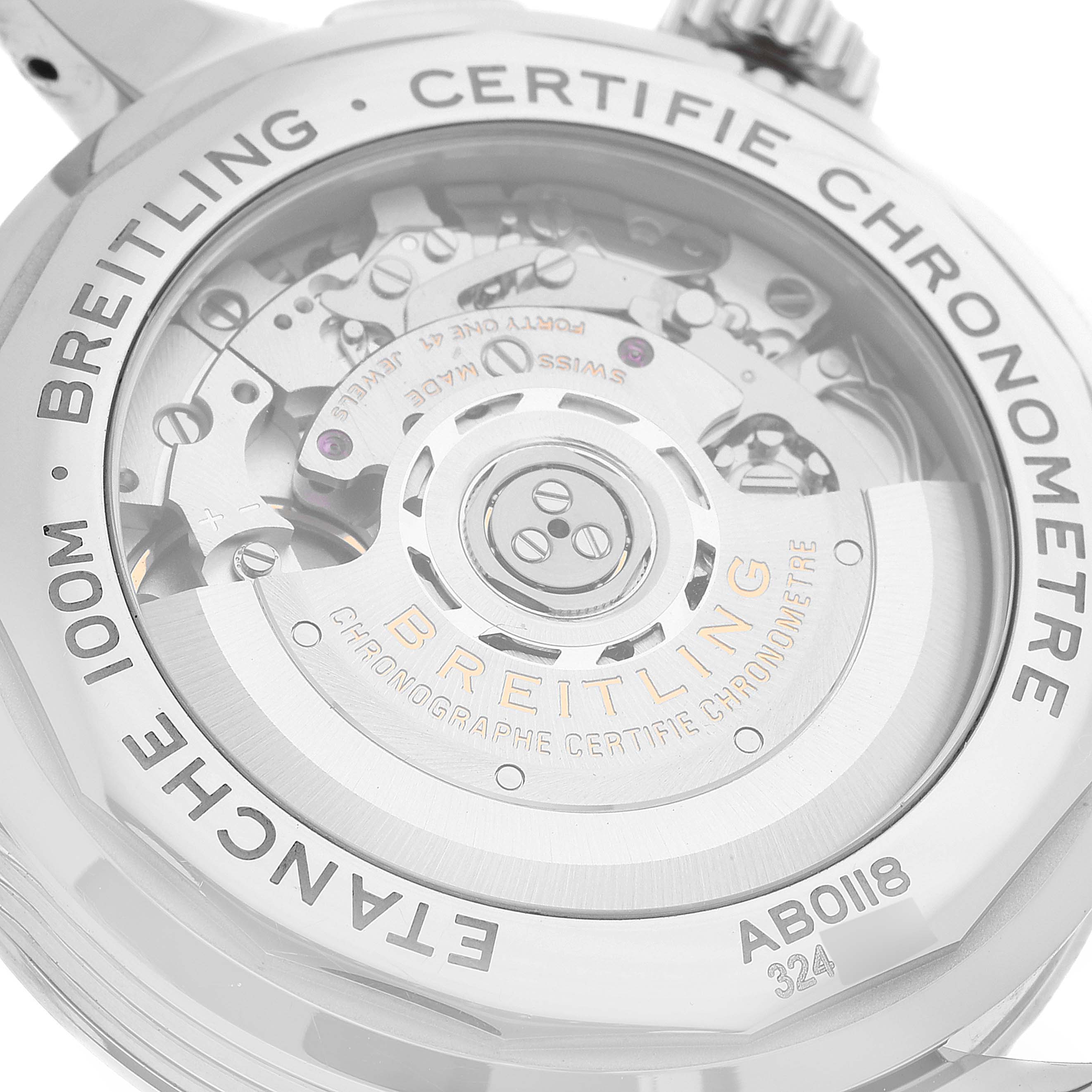 The image shows the back of a Breitling Premier AB0118221G1P2 Men's Stainless Steel Silver Dial AB0118221G1P2 Men's Stainless Steel Silver Dial watch, highlighting its internal mechanisms and engravings.