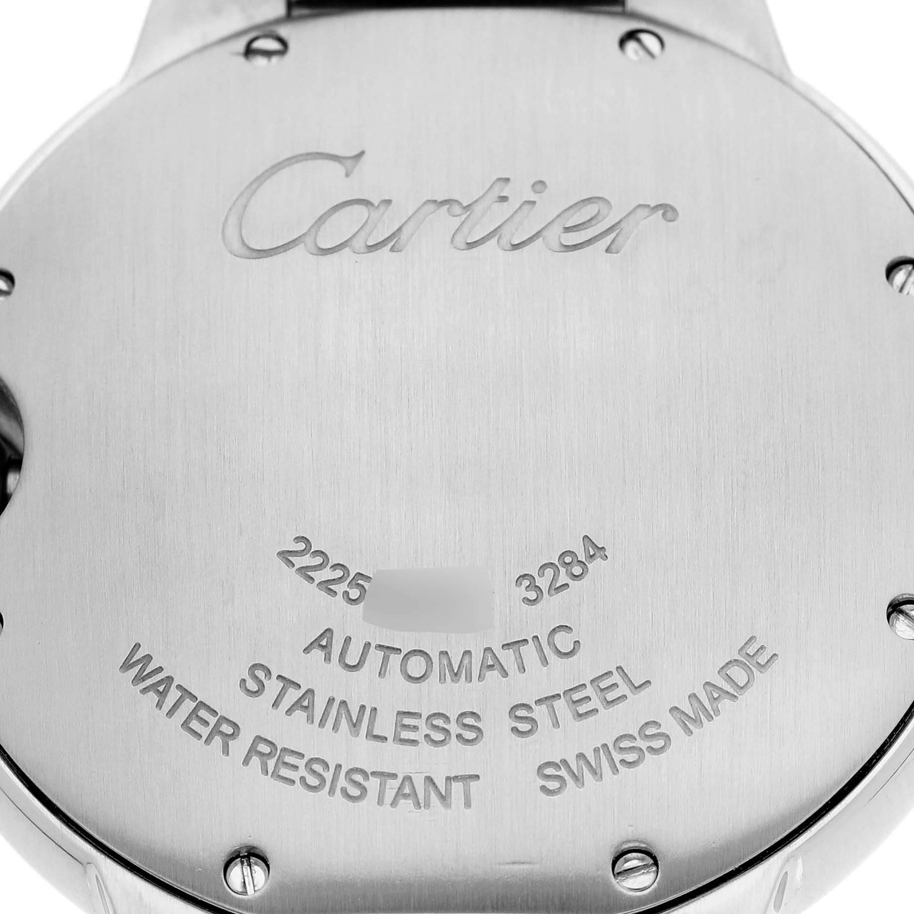 The image shows the back case of the Cartier Ballon Bleu W6920046 Women's Stainless Steel Silver Dial watch, highlighting the engraved logos and specifications.