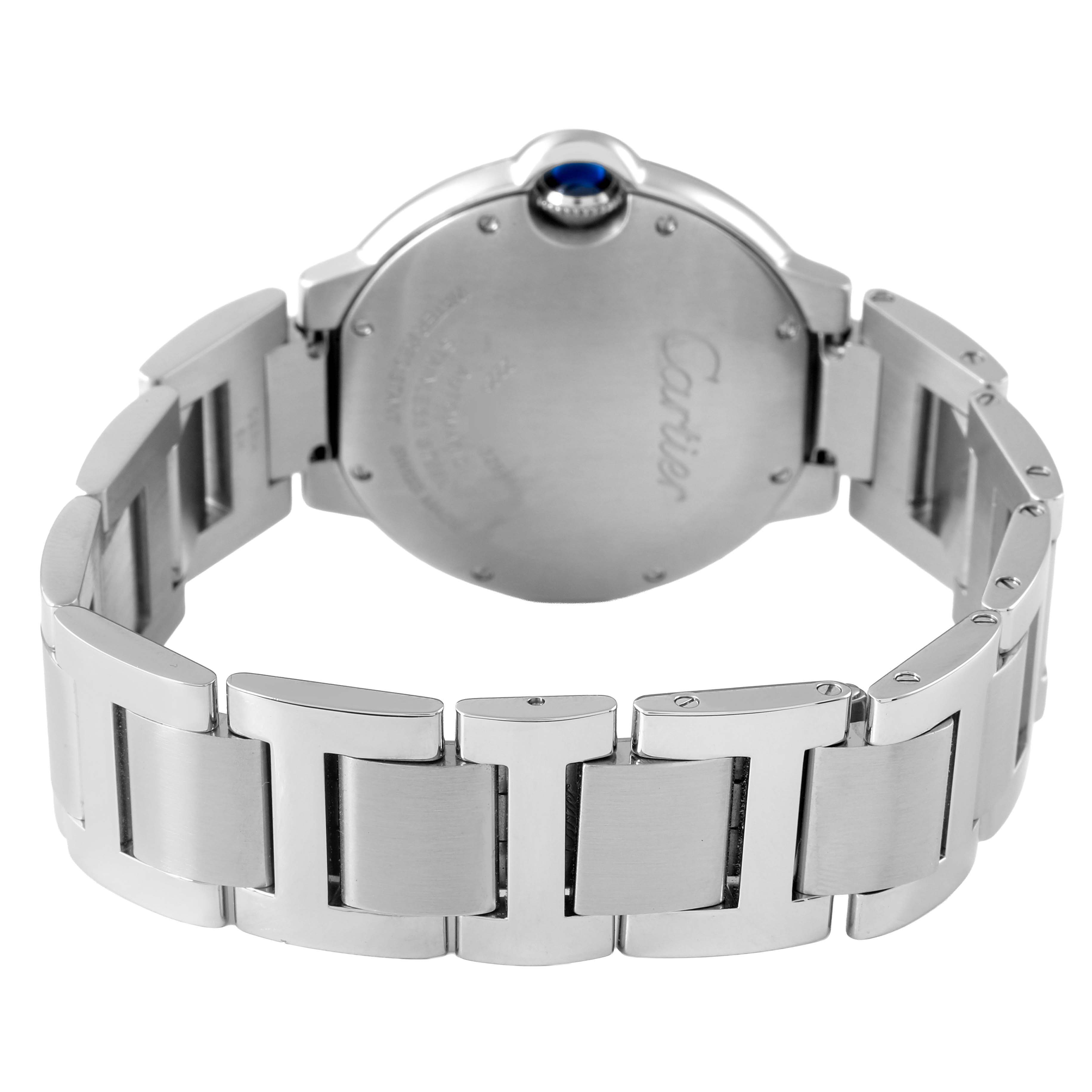The image shows the back view of a Ballon Bleu de Cartier watch, highlighting its metal bracelet and clasp.