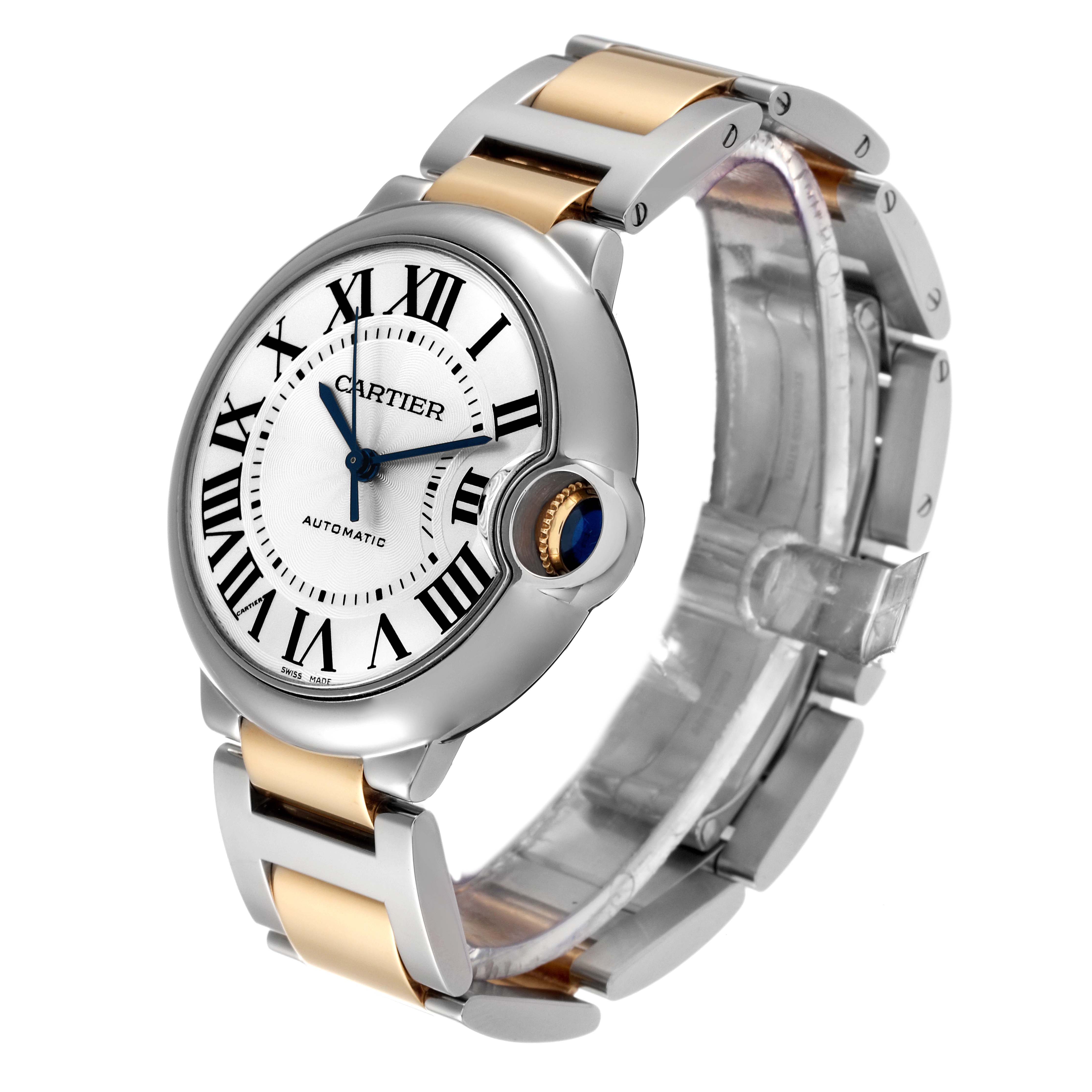 The image shows a side angle of a Cartier Ballon Bleu W2BB0012 Men
s Steel and Gold (two tone) Silver Dial W2BB0012 Men
s Steel and Gold (two tone) Silver Dial watch, focusing on the dial, crown, and two-tone bracelet.