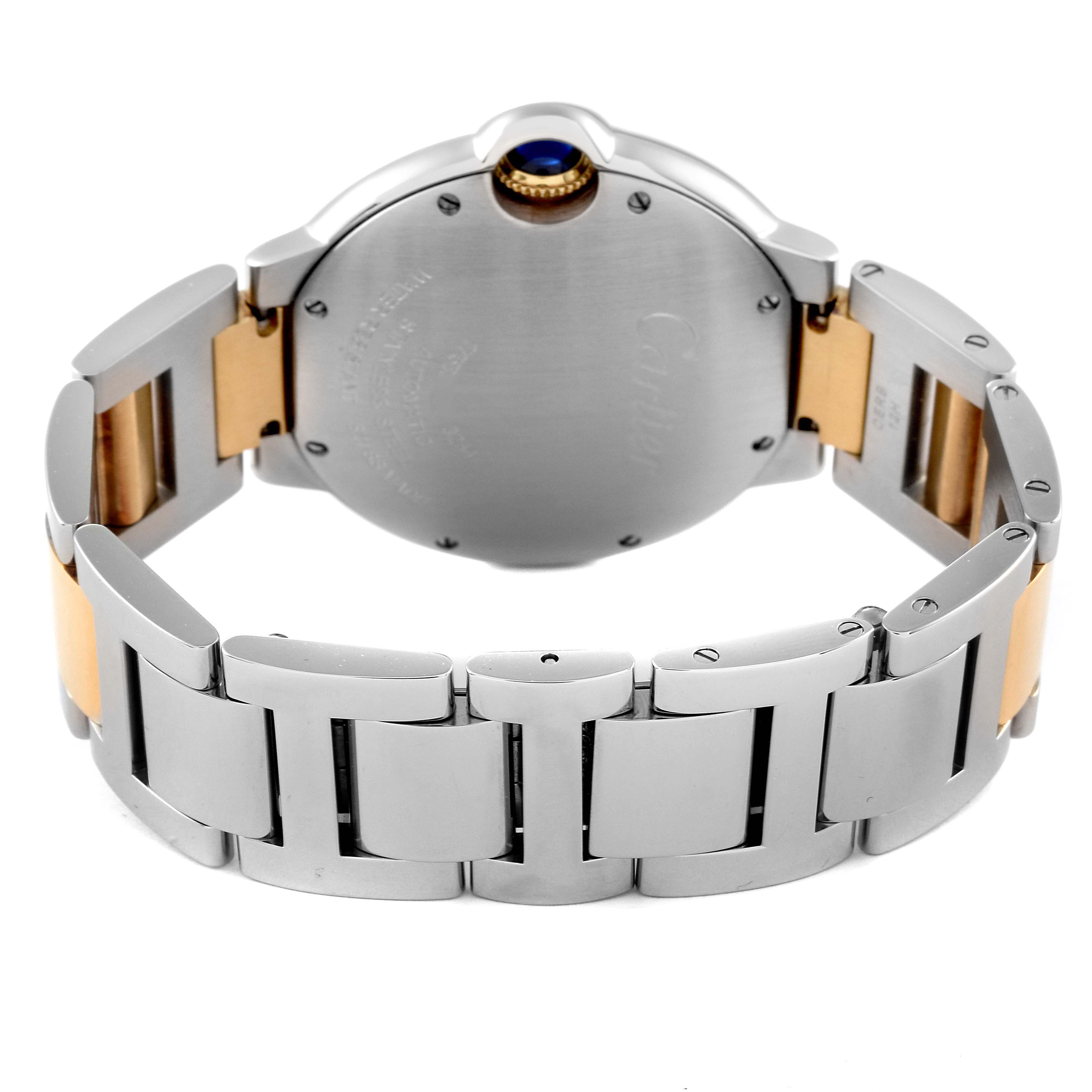 The image shows the back of a Cartier Ballon Bleu W2BB0012 Men
s Steel and Gold (two tone) Silver Dial W2BB0012 Men
s Steel and Gold (two tone) Silver Dial watch and part of its metal strap.