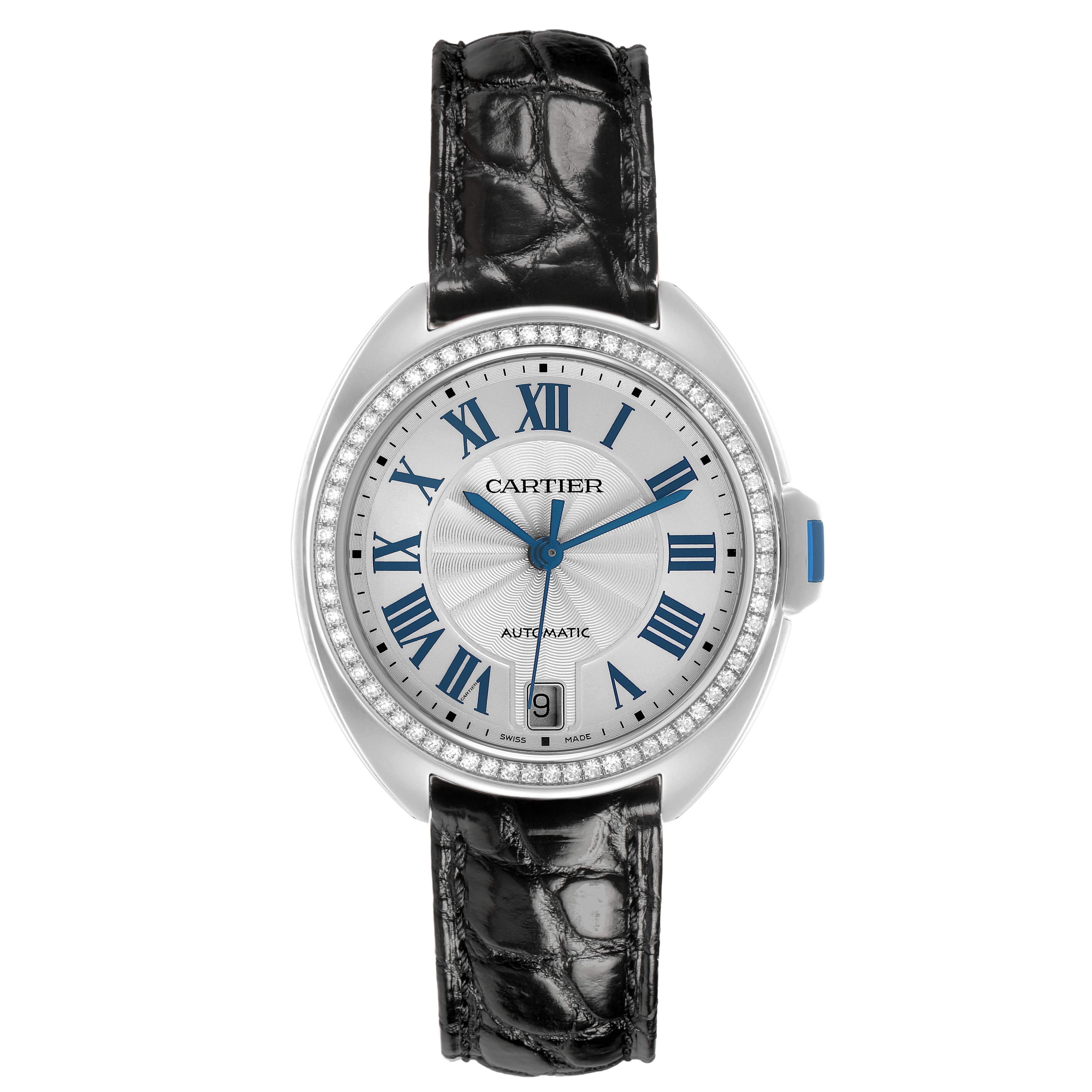 The Cartier Clé watch is shown from the front, displaying its face, Roman numerals, date display, and black leather strap.
