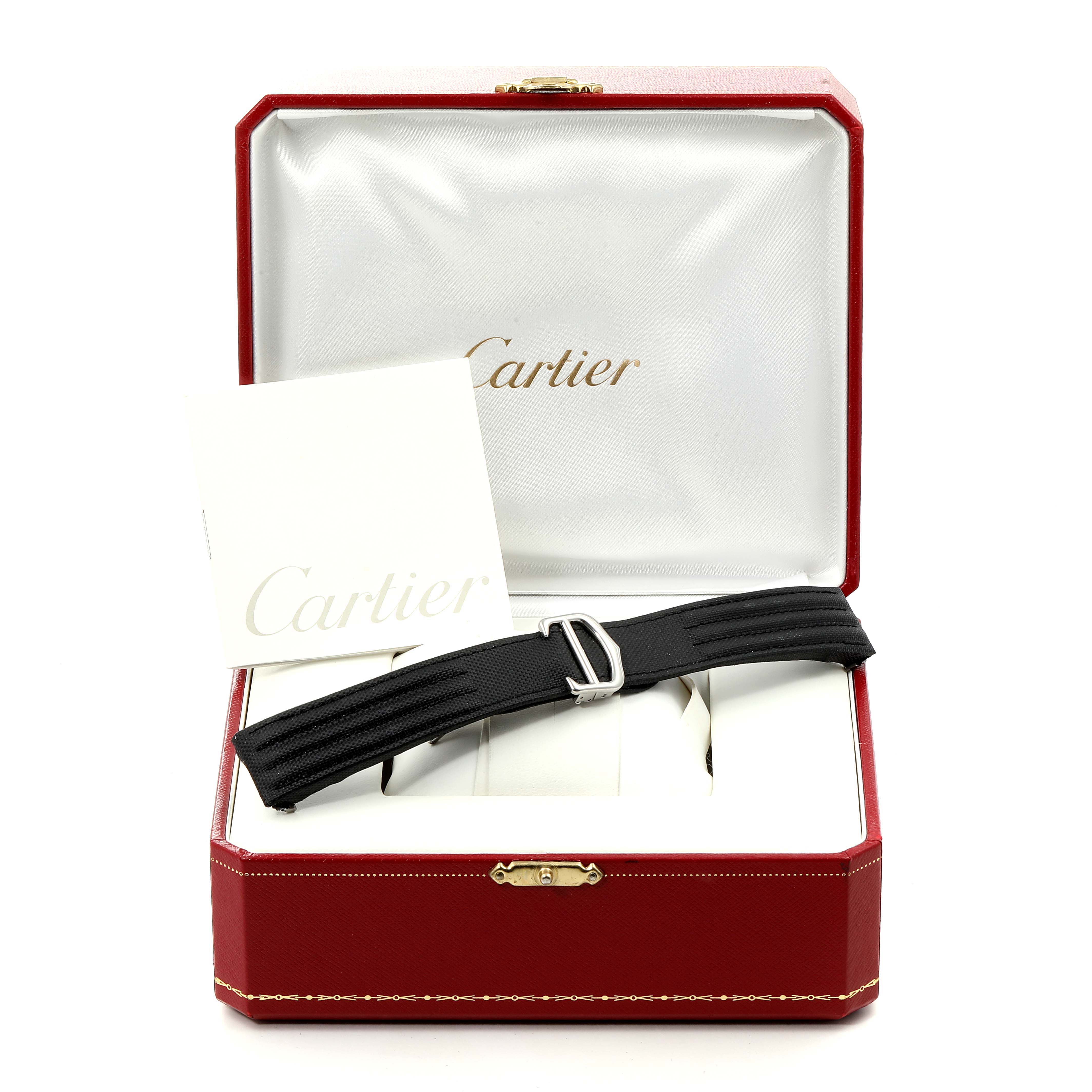 The image shows a Cartier Roadster W62006X6 Men
s Stainless Steel Silver Dial W62006X6 Men
s Stainless Steel Silver Dial watch strap and documents inside an open Cartier box, viewed from the front.