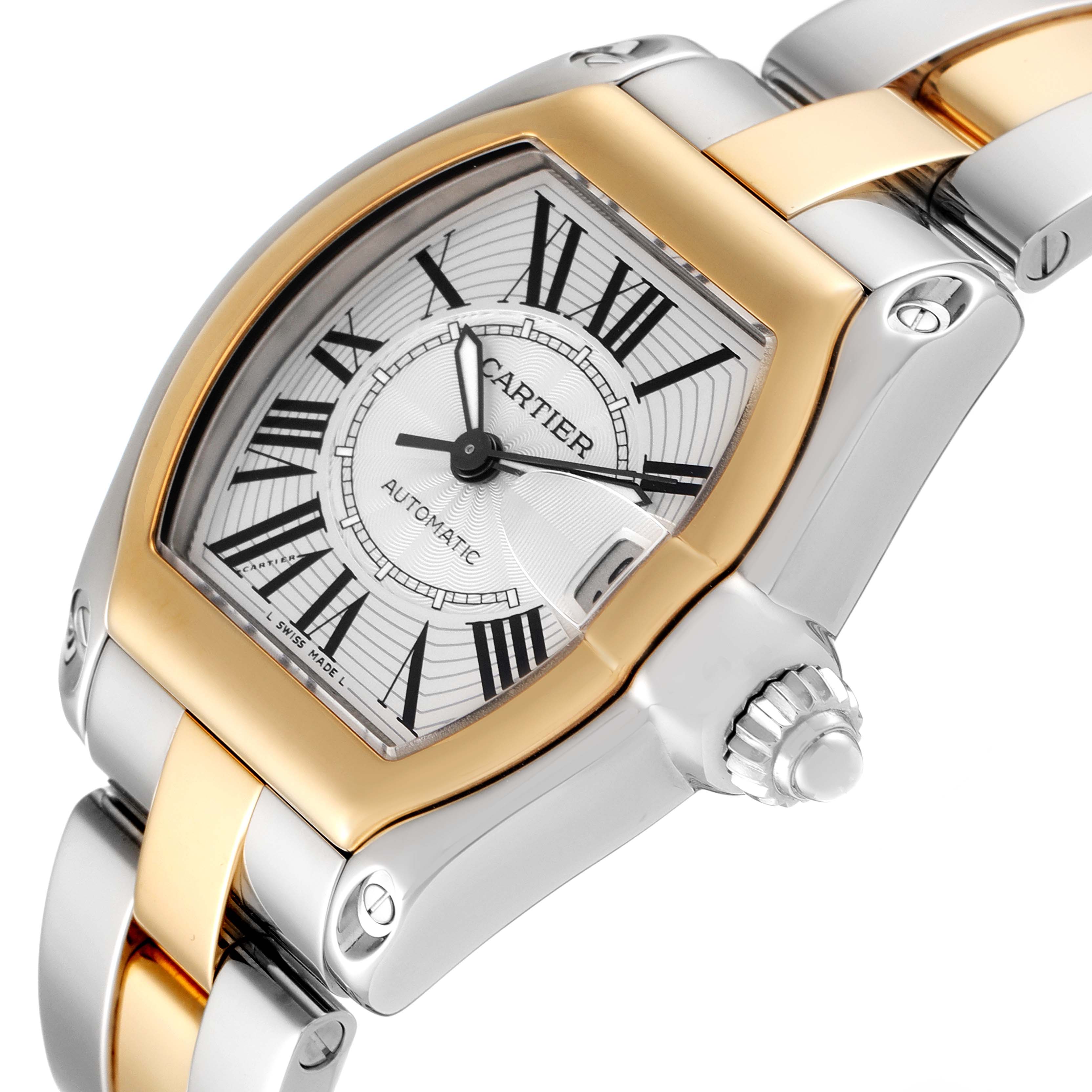 The image shows a close-up of the Cartier Roadster W62031Y4 Men
s Steel and Gold (two tone) Silver Dial W62031Y4 Men
s Steel and Gold (two tone) Silver Dial watch, highlighting its dial, bezel, and crown from a three-quarter angle.