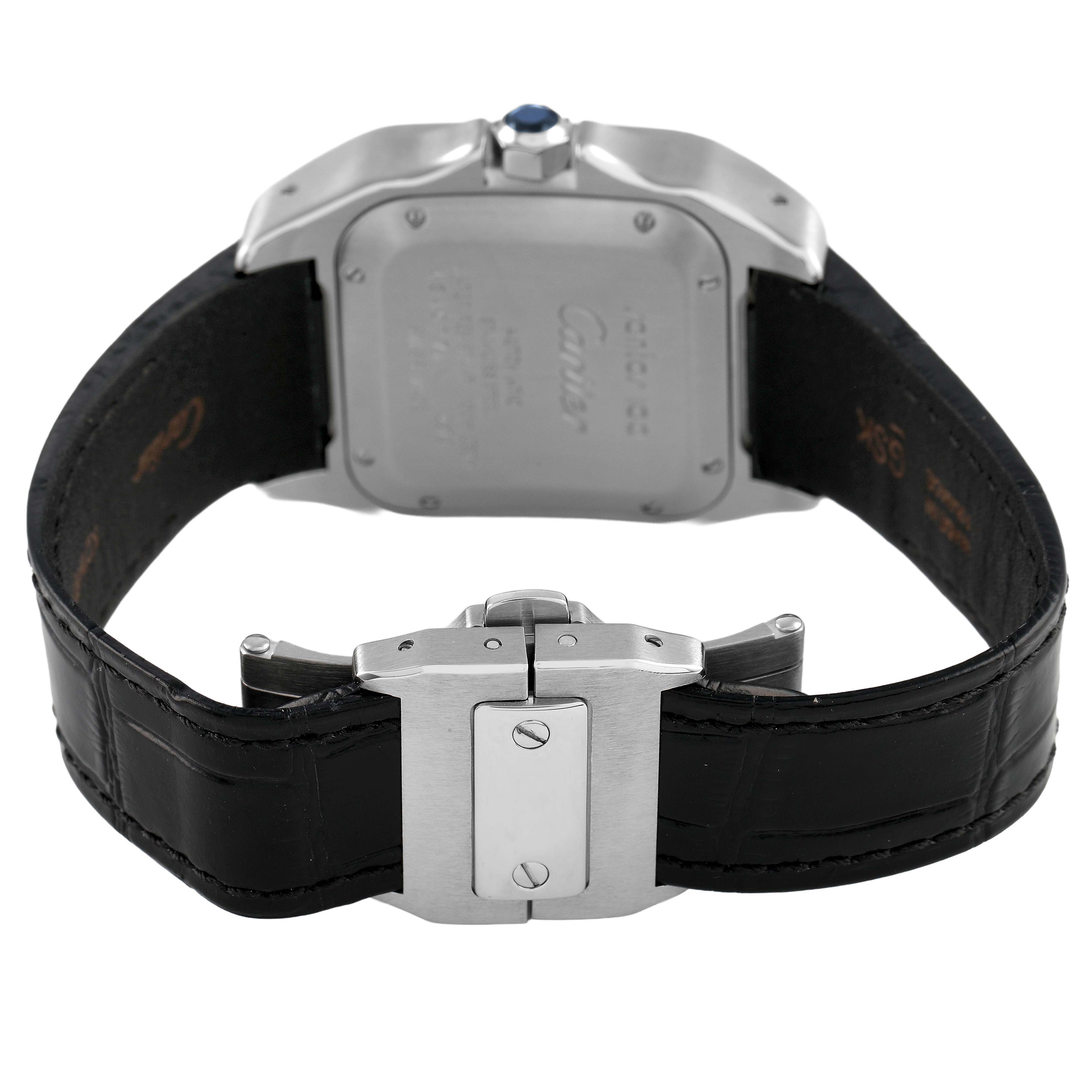 The image shows the back and clasp of a Cartier Santos W20106X8 Men's Stainless Steel Silver Dial watch, highlighting the leather strap and case back.