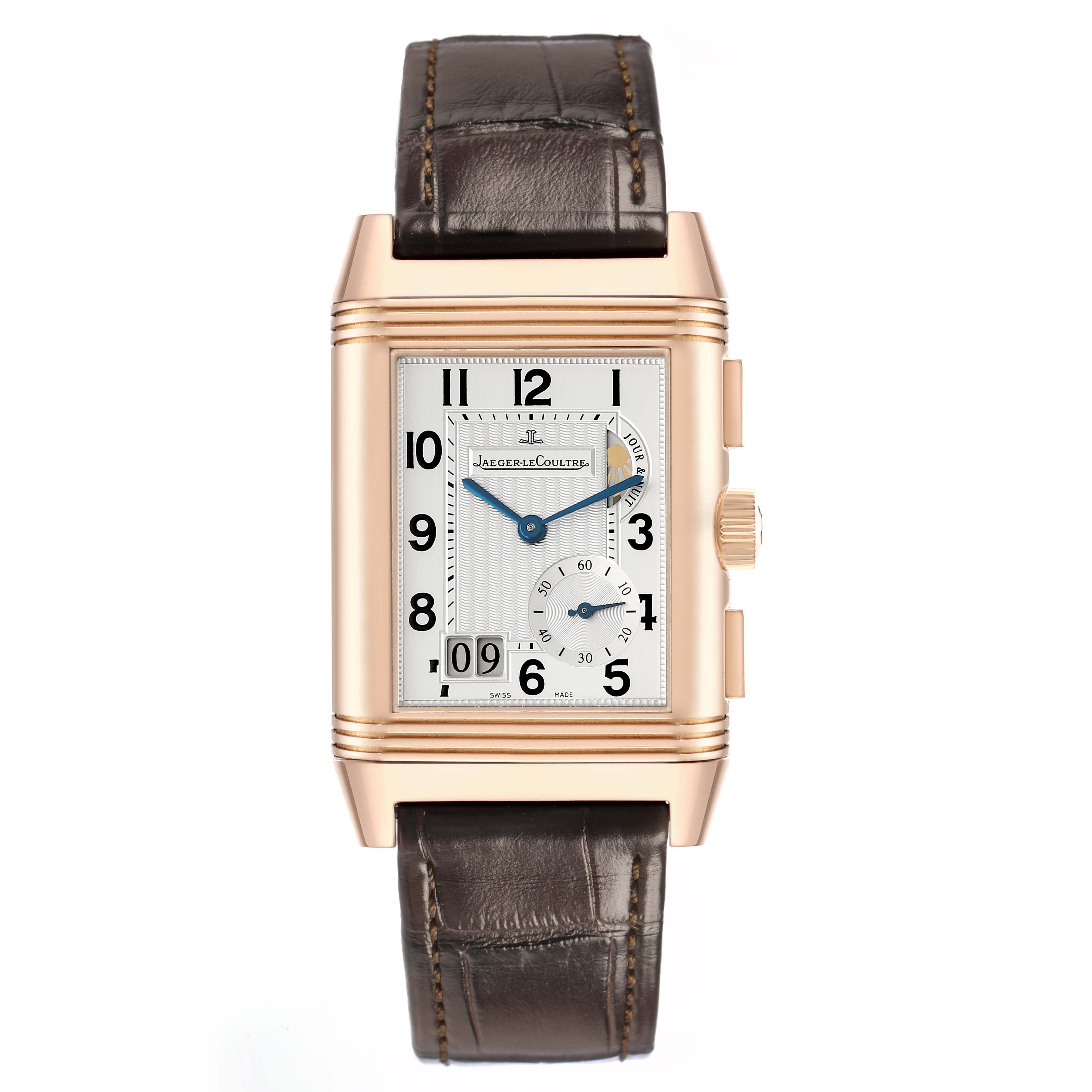 The Jaeger LeCoultre Reverso Q3022420 Men's Rose Gold Silver Dial watch is shown from the front, displaying its rectangular dial, case, and leather strap.