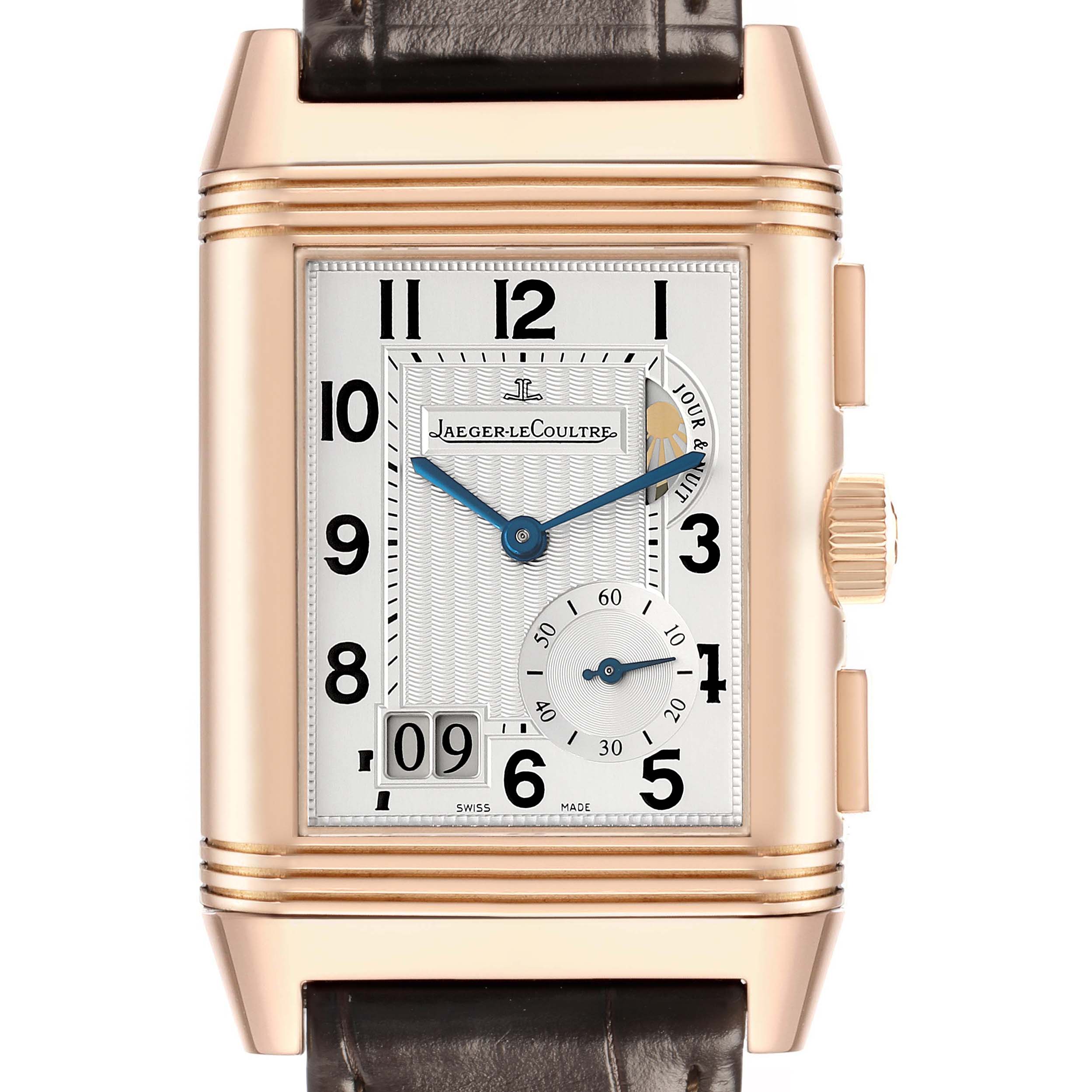 The Jaeger-LeCoultre Reverso watch is shown from the front, displaying its rectangular face, dial, subdial, and crown.