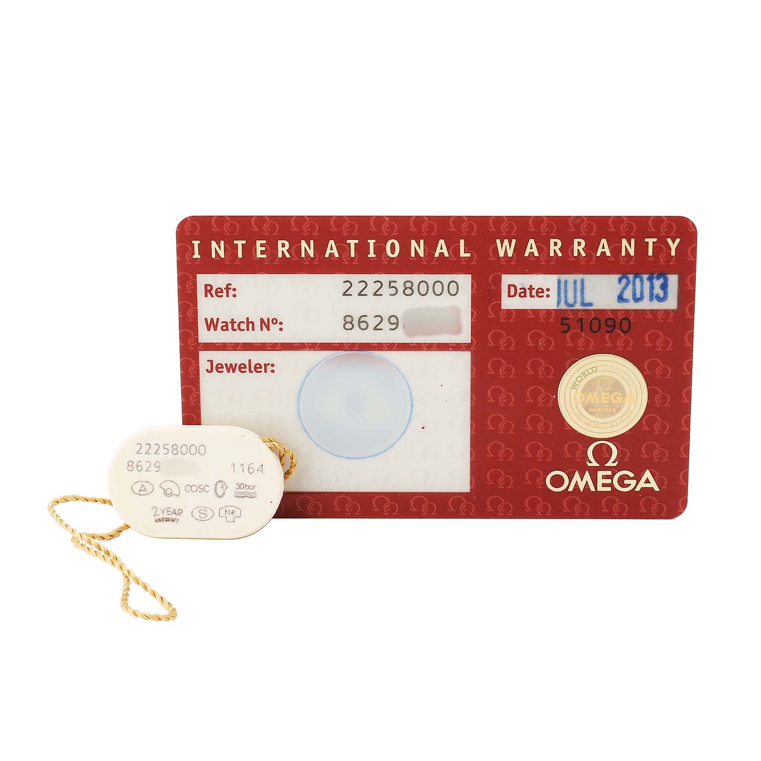 The image shows an Omega Seamaster 2225.80.00 Men's Stainless Steel Blue Dial warranty card and a tag with the reference number.